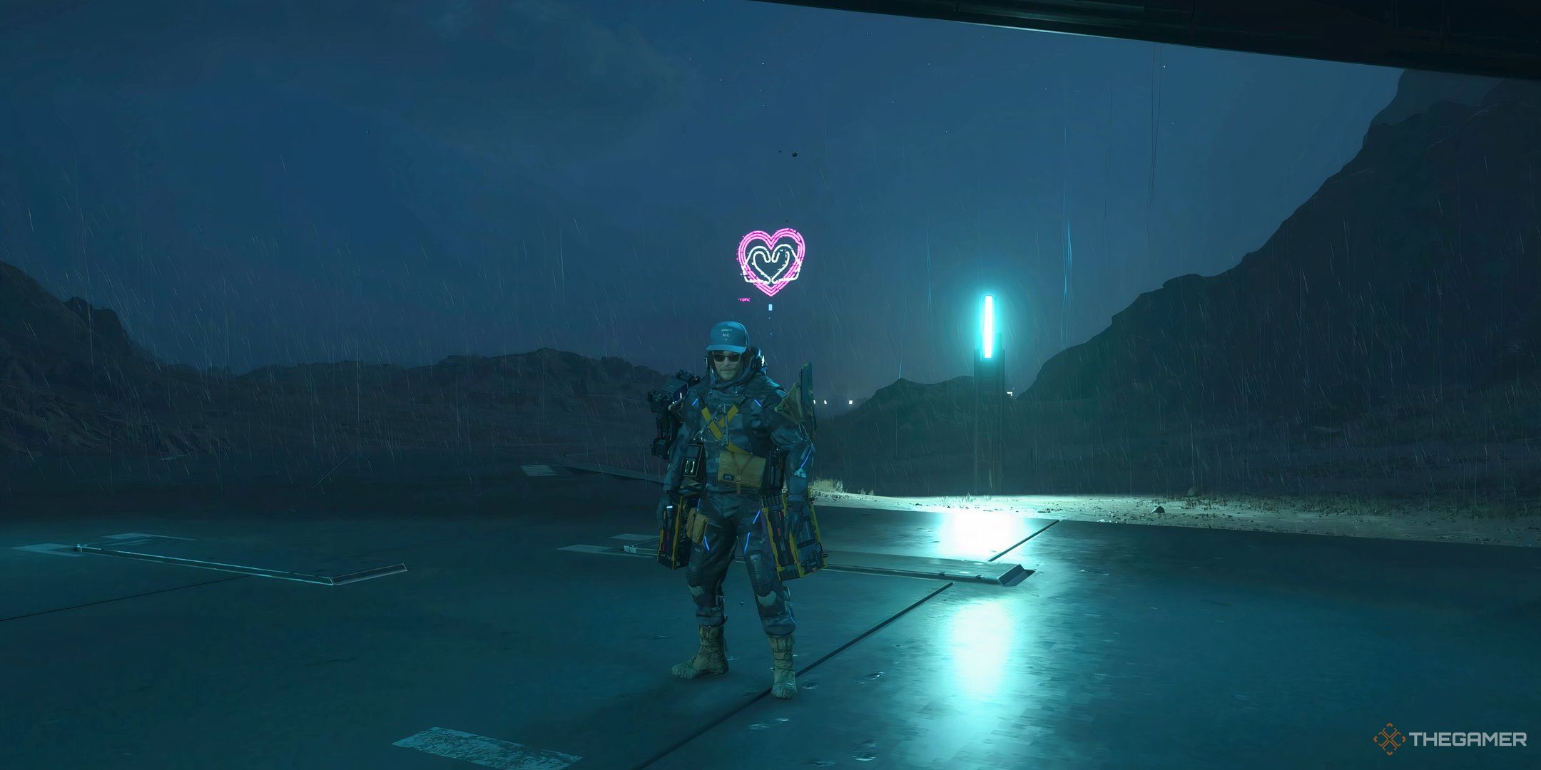Death Stranding 2 Sam standing in front of a heart sign.