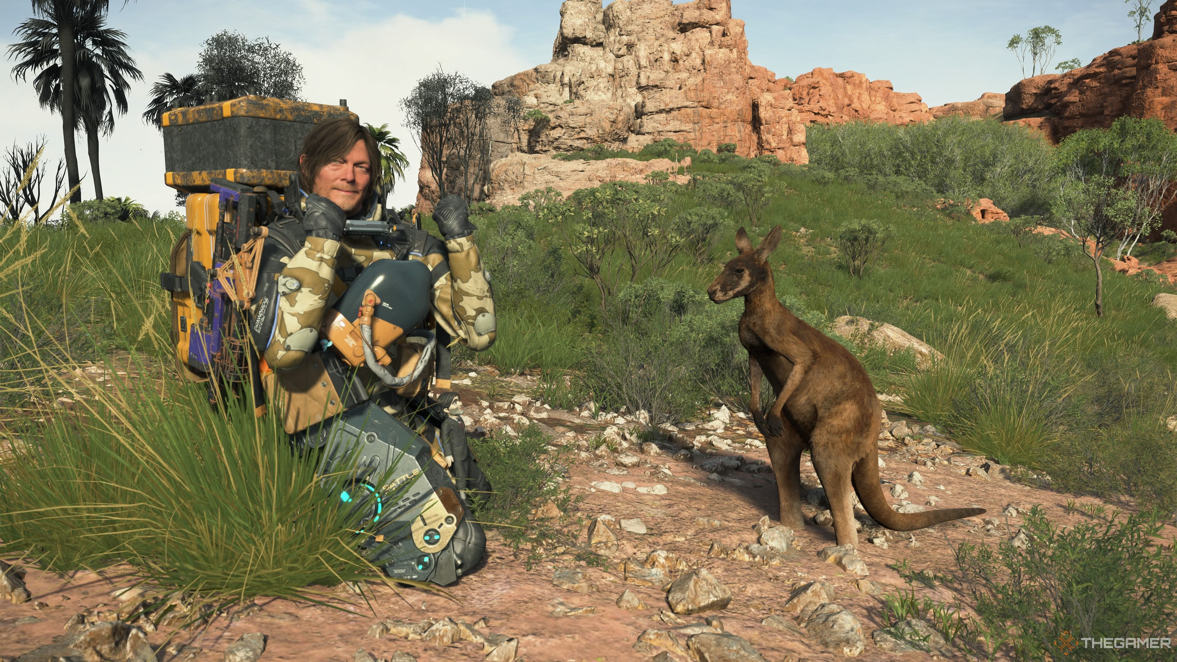 Sam poses with a wild kangaroo in Death Stranding 2. 