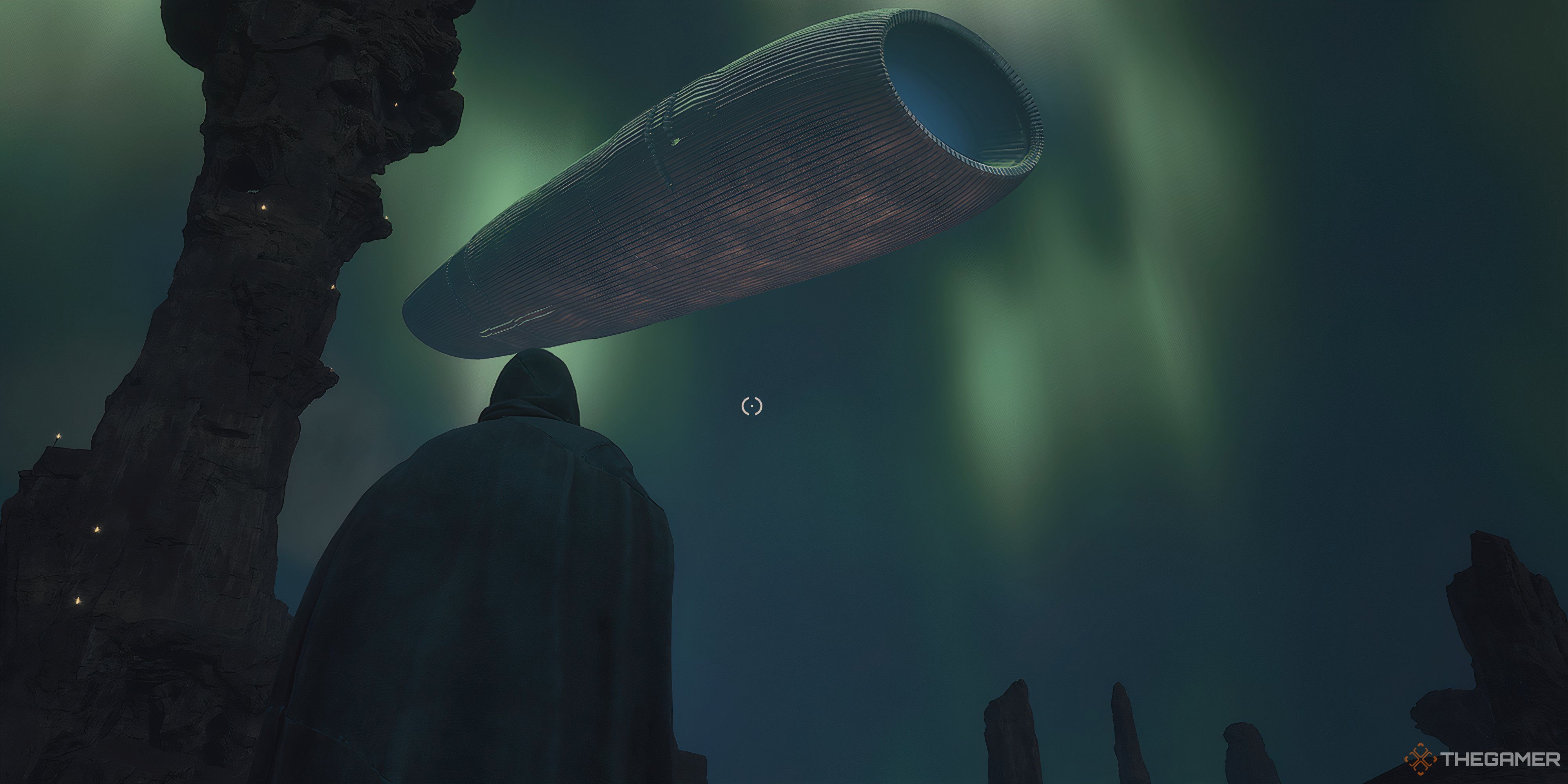 Player walking with a larger tube shaped ship overhead in Dune: Awakening. There are green lights in the night sky with giant rock pillar on the left.