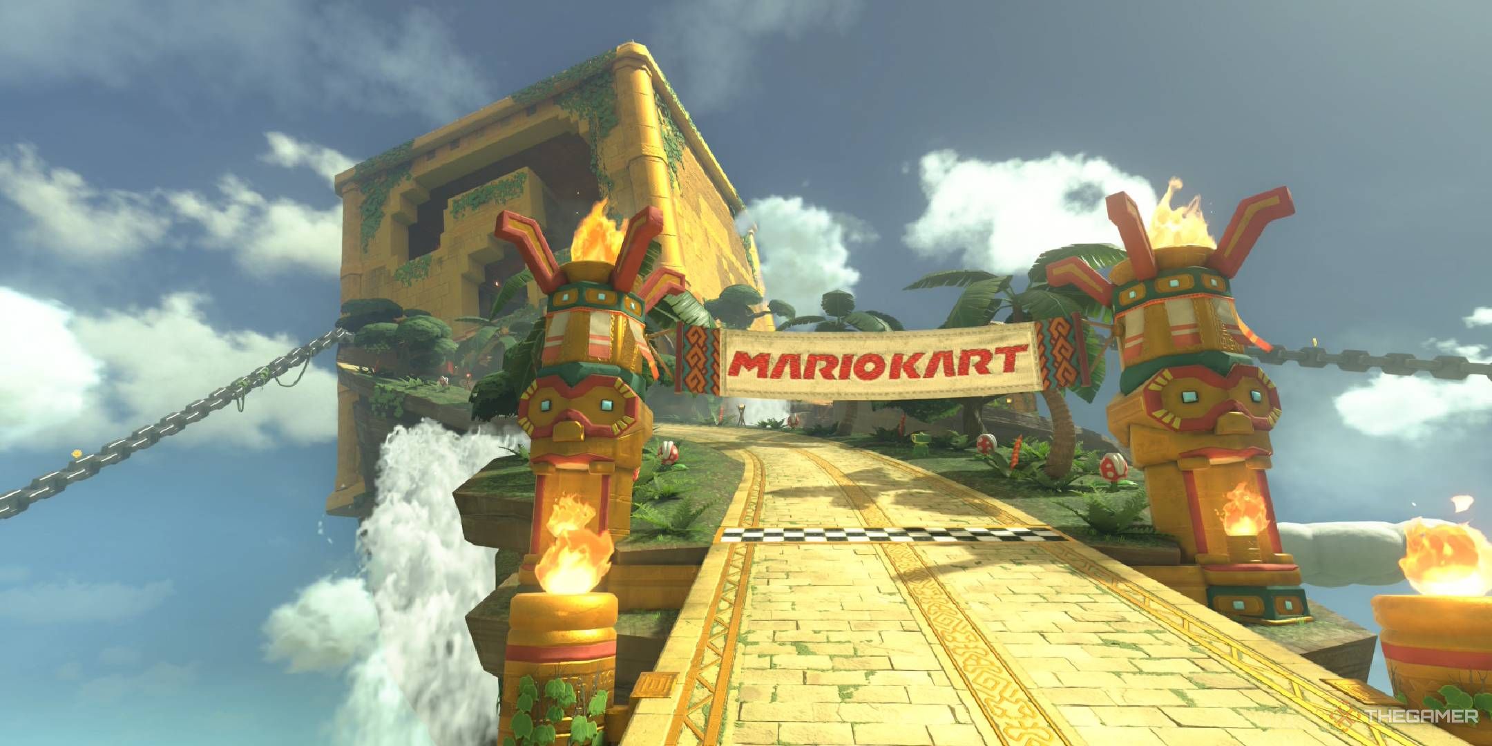 Great _ Block Ruins starting line with giant ruined _ Block in the background with aztec theming from Mario Kart World.