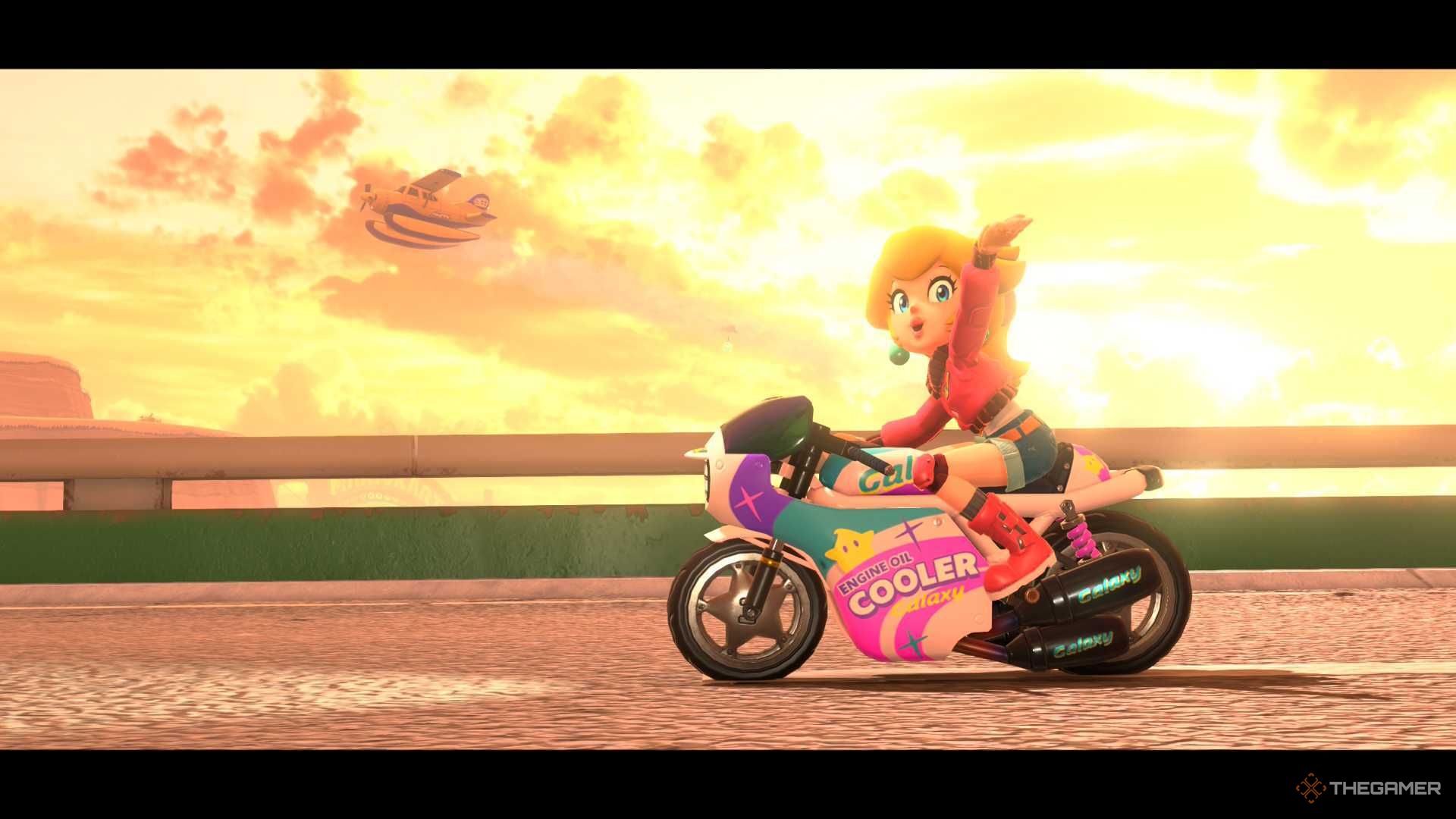 Mario Kart World Peach Waving On Bike On Sunset Bridge.