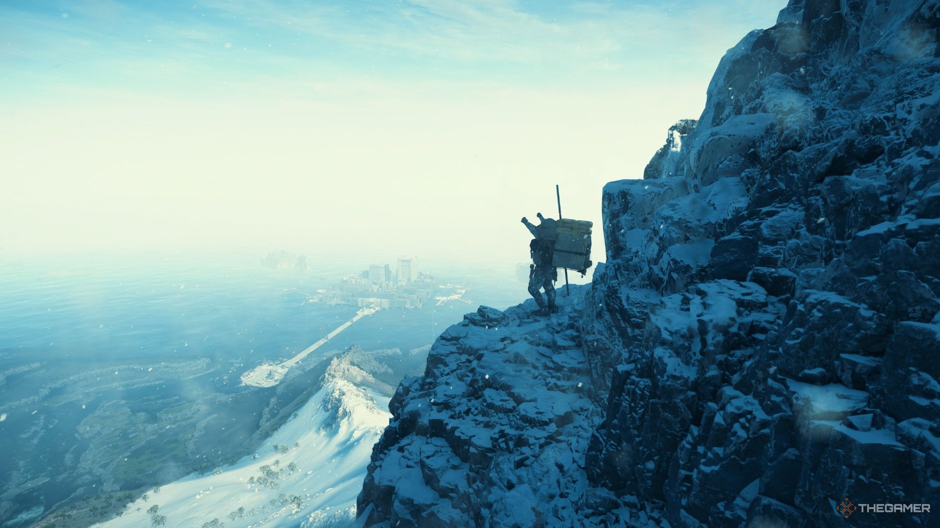 Sam reaches the top of a snowy mountain and poses in triumph in Death Stranding 2. 