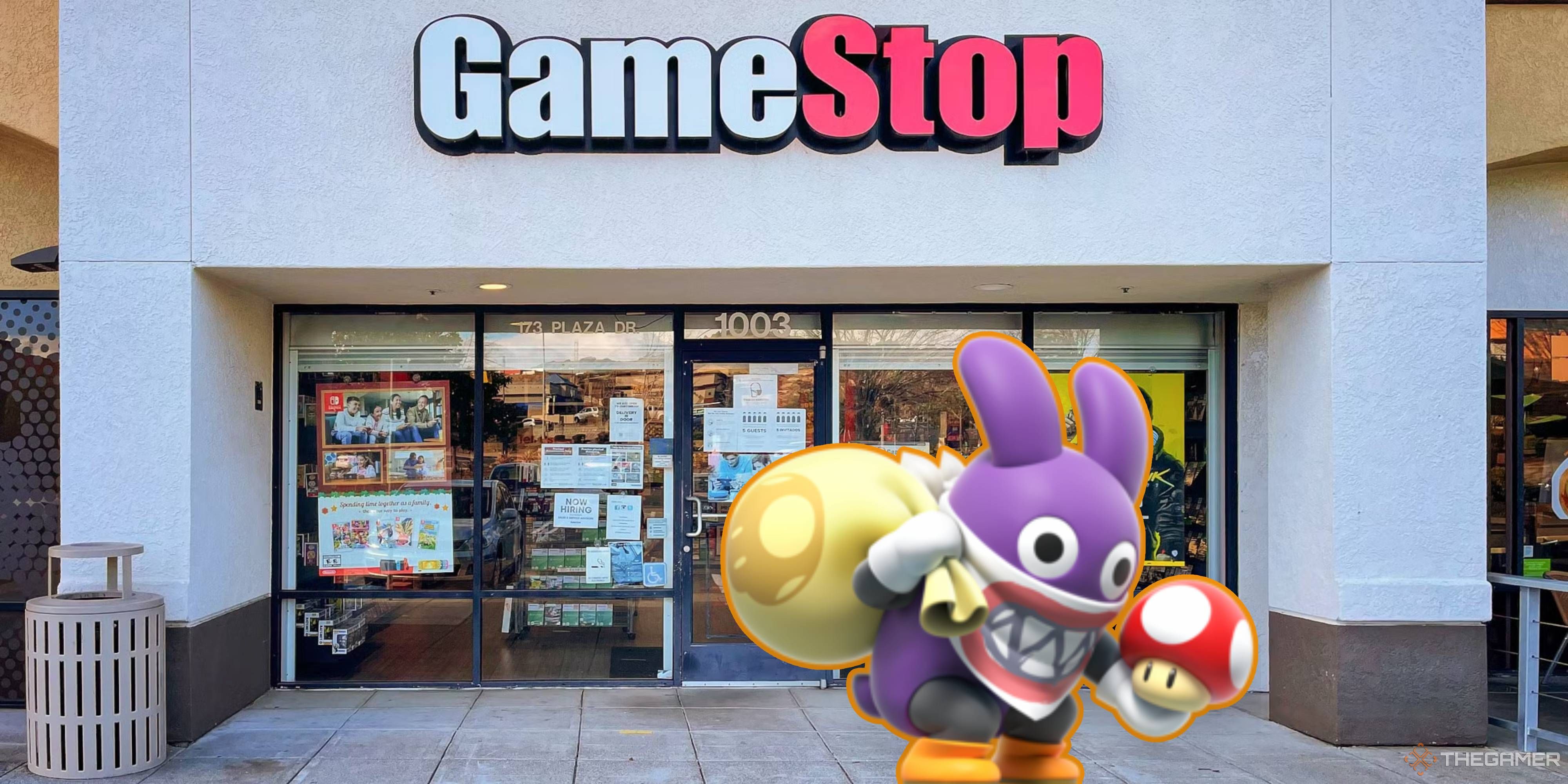 nabbit holding a sack and a mario mushroom outside of a gamestop store.