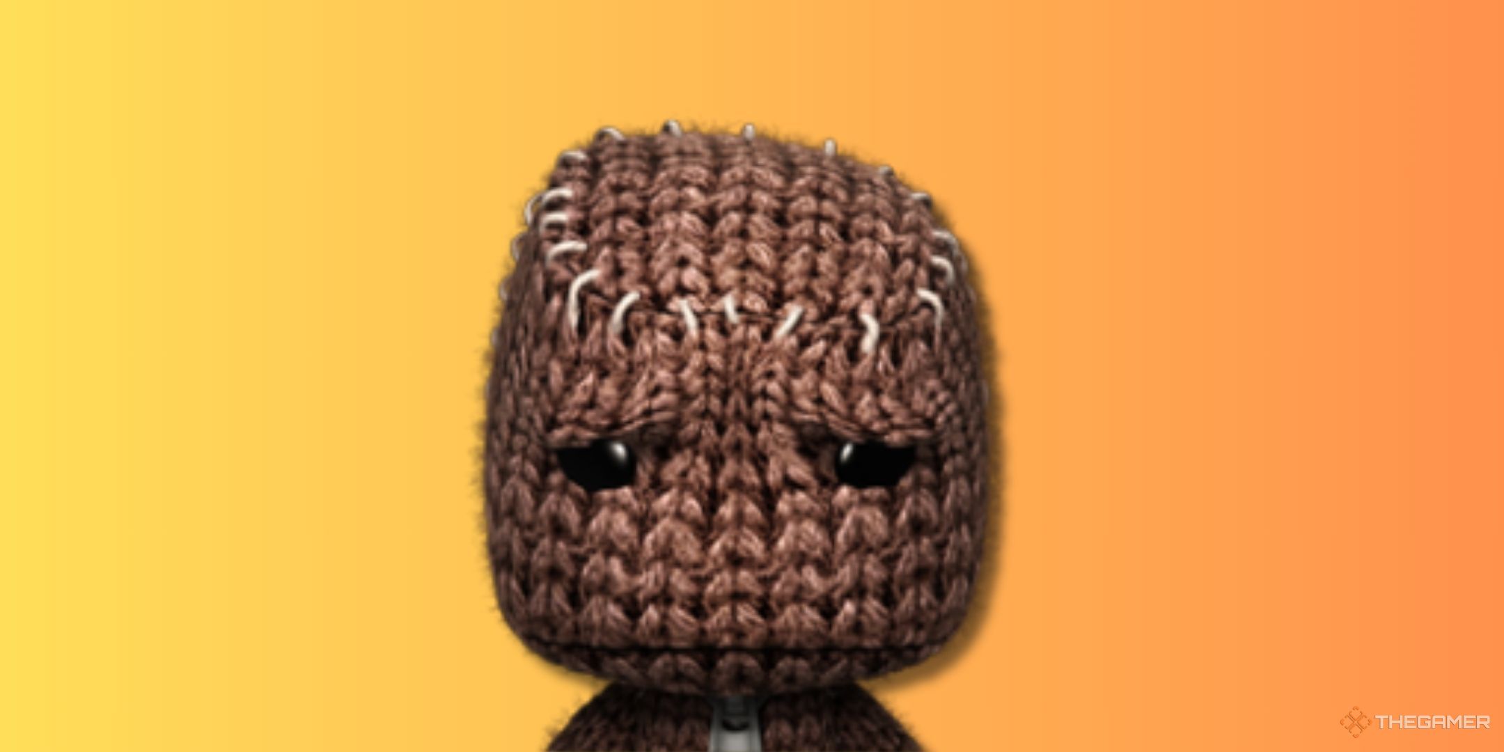 Sackboy looking down with a sad expression on an orange background.