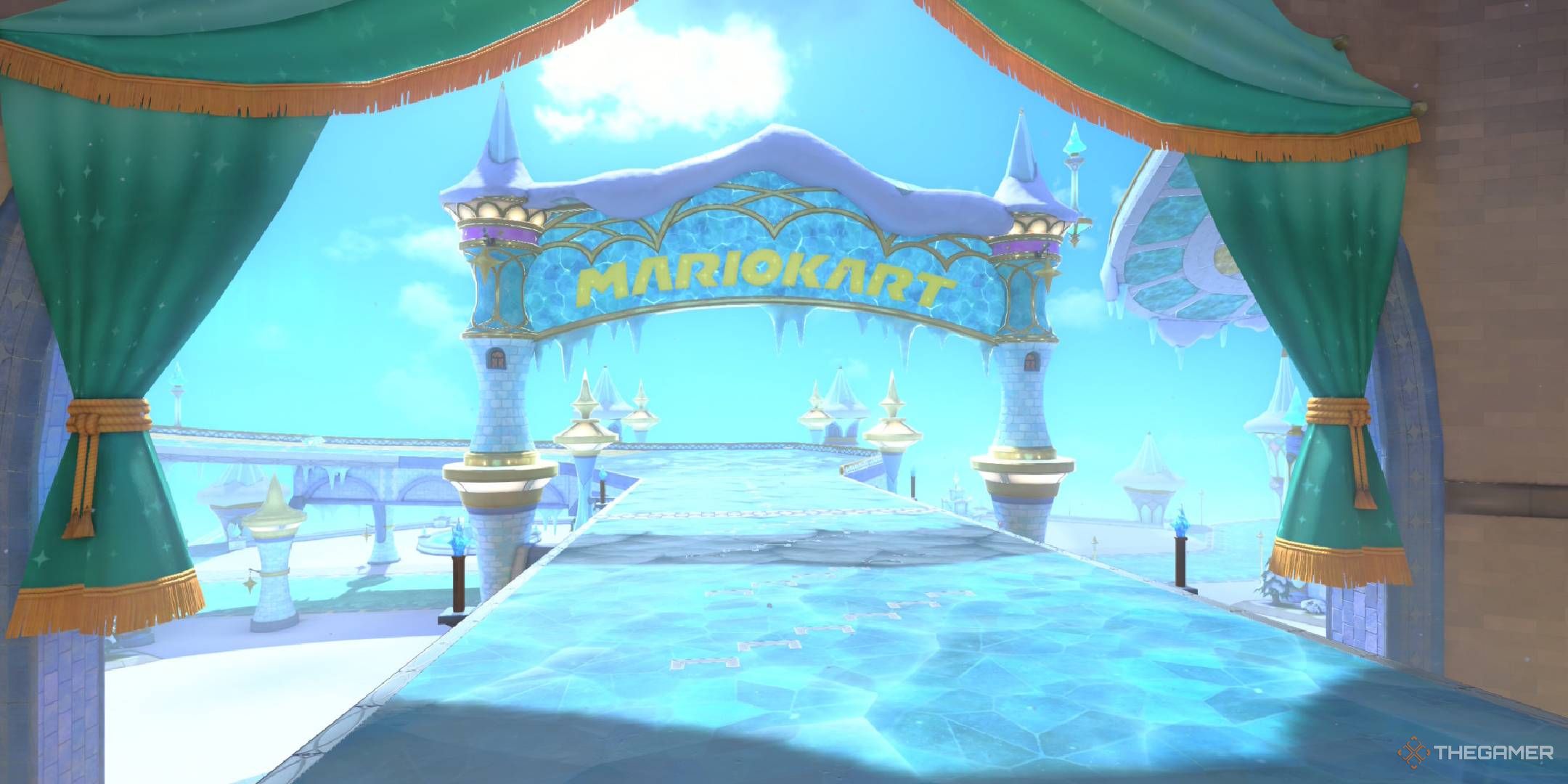 Starview Peak starting line with a frosty sign and icy road looking out at the castle peaks from Mario Kart World.