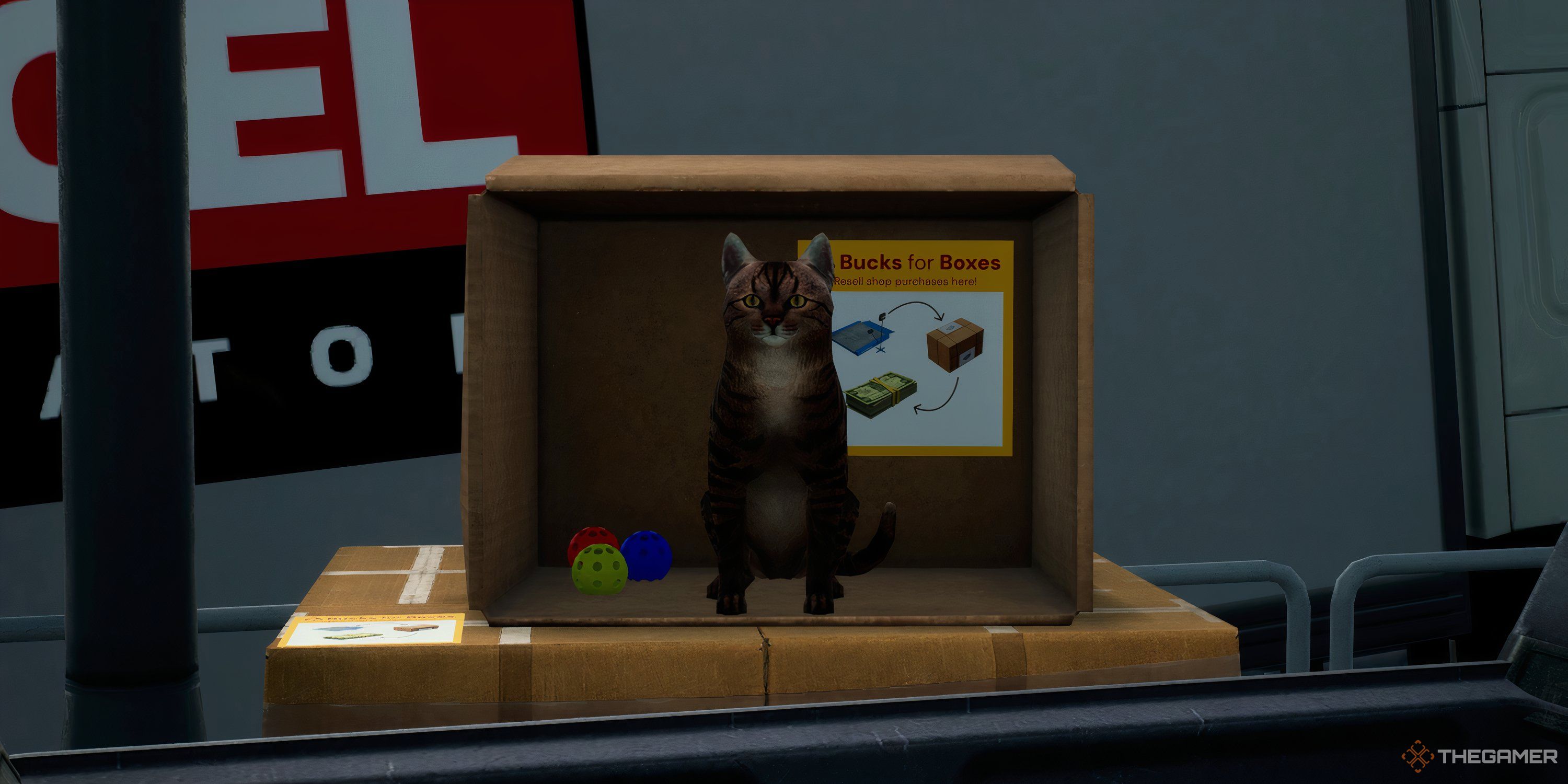 Tabby cat sitting in a cardboard box with colorful toy balls behind the Sell Boxes station in Parcel Simulator.