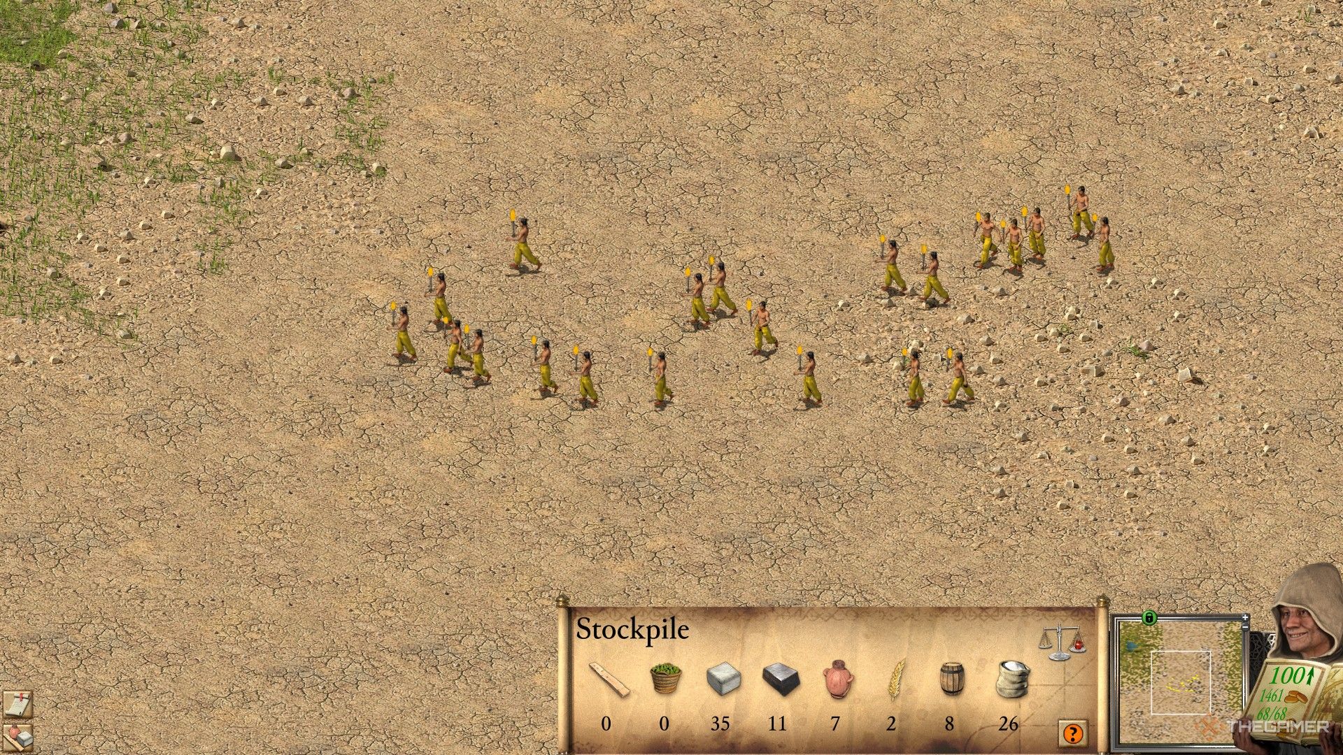 a large group of slaves armed with torches marches through the desert in stronghold crusader: definitive edition.