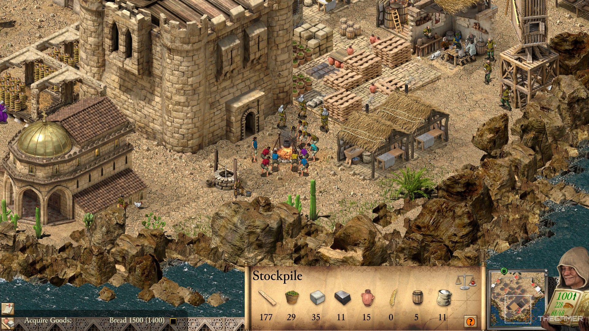 a group of peasants wait around a campfire to be assigned to tasks in stronghold crusader: definitive edition.