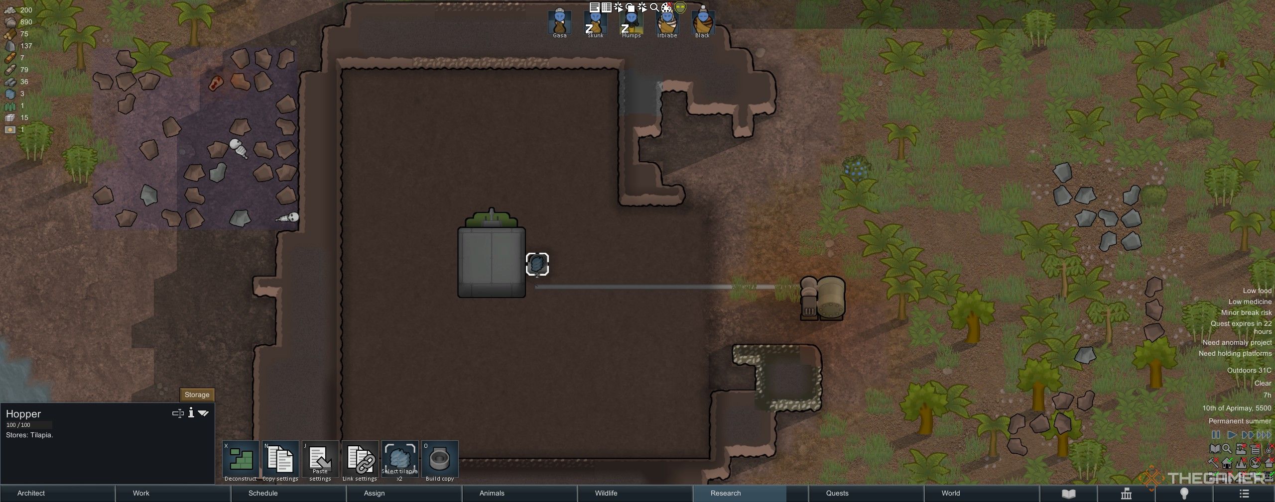 A Nutrient Paste Dispenser with fish in a hopper in Rimworld.
