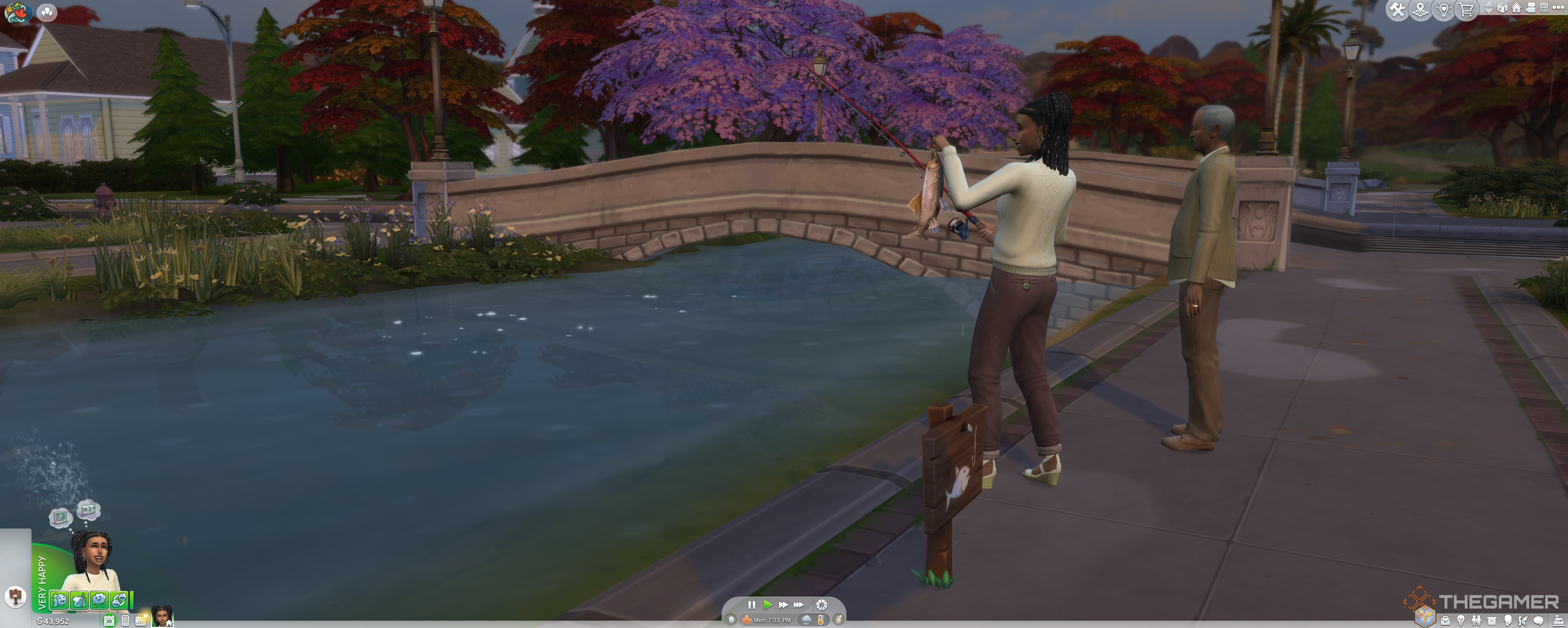A Sim catching a fish in Willow Creek river