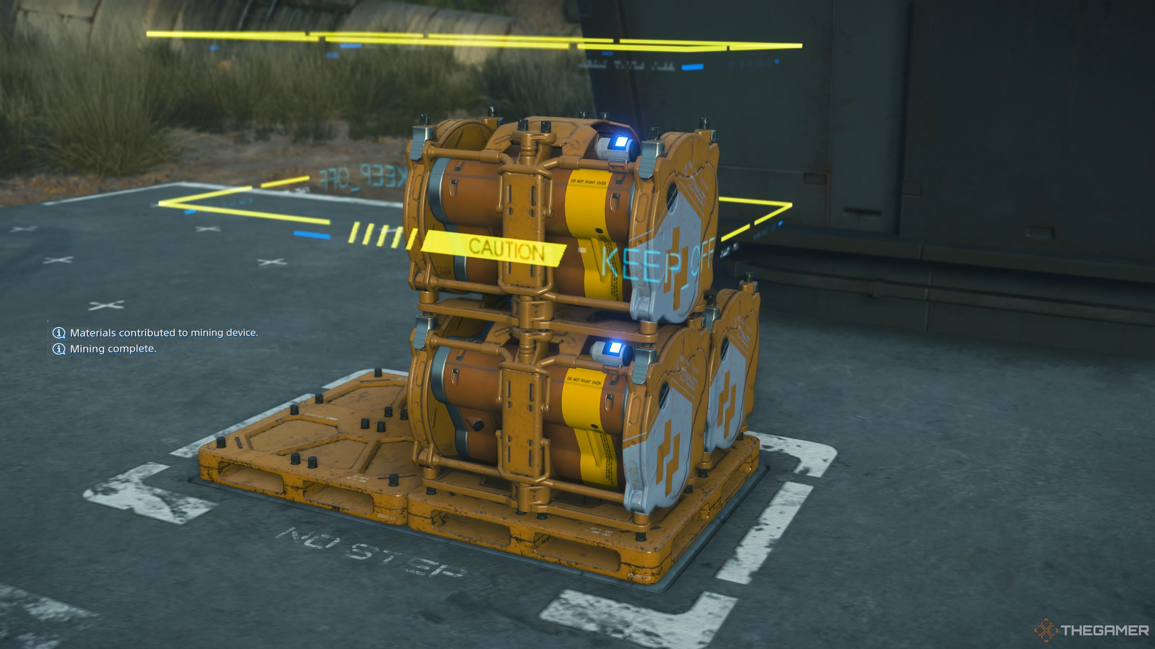 A pile of materials at a mine in death stranding 2 on the beach.