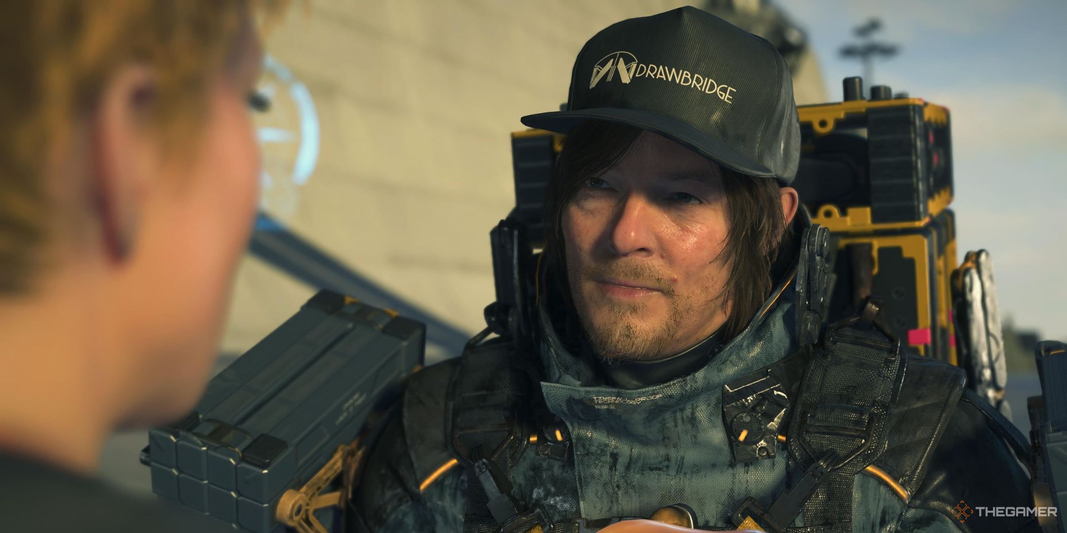 Sam looking concerned in Death Stranding 2: On the Beach.