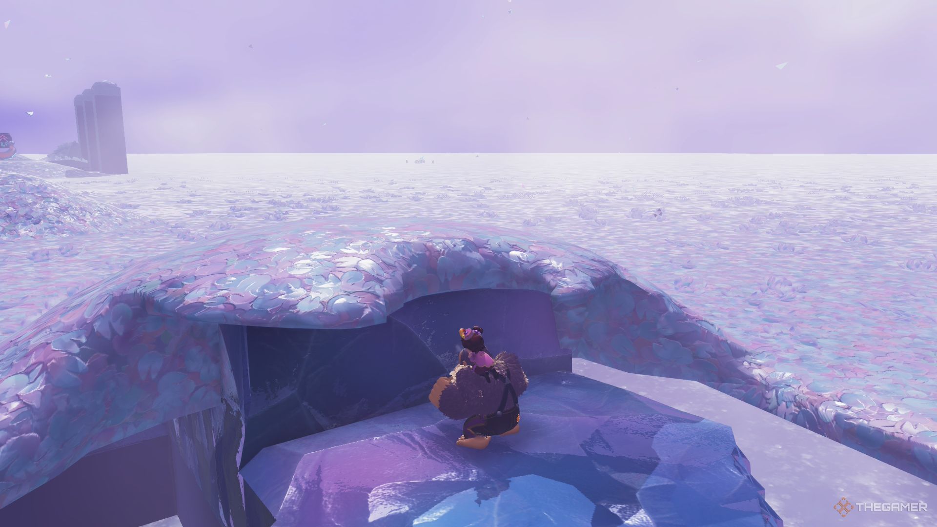 Donkey Kong stands in front of a wall on ice in the Precarious, Powdery Path course in Donkey Kong Bananza.