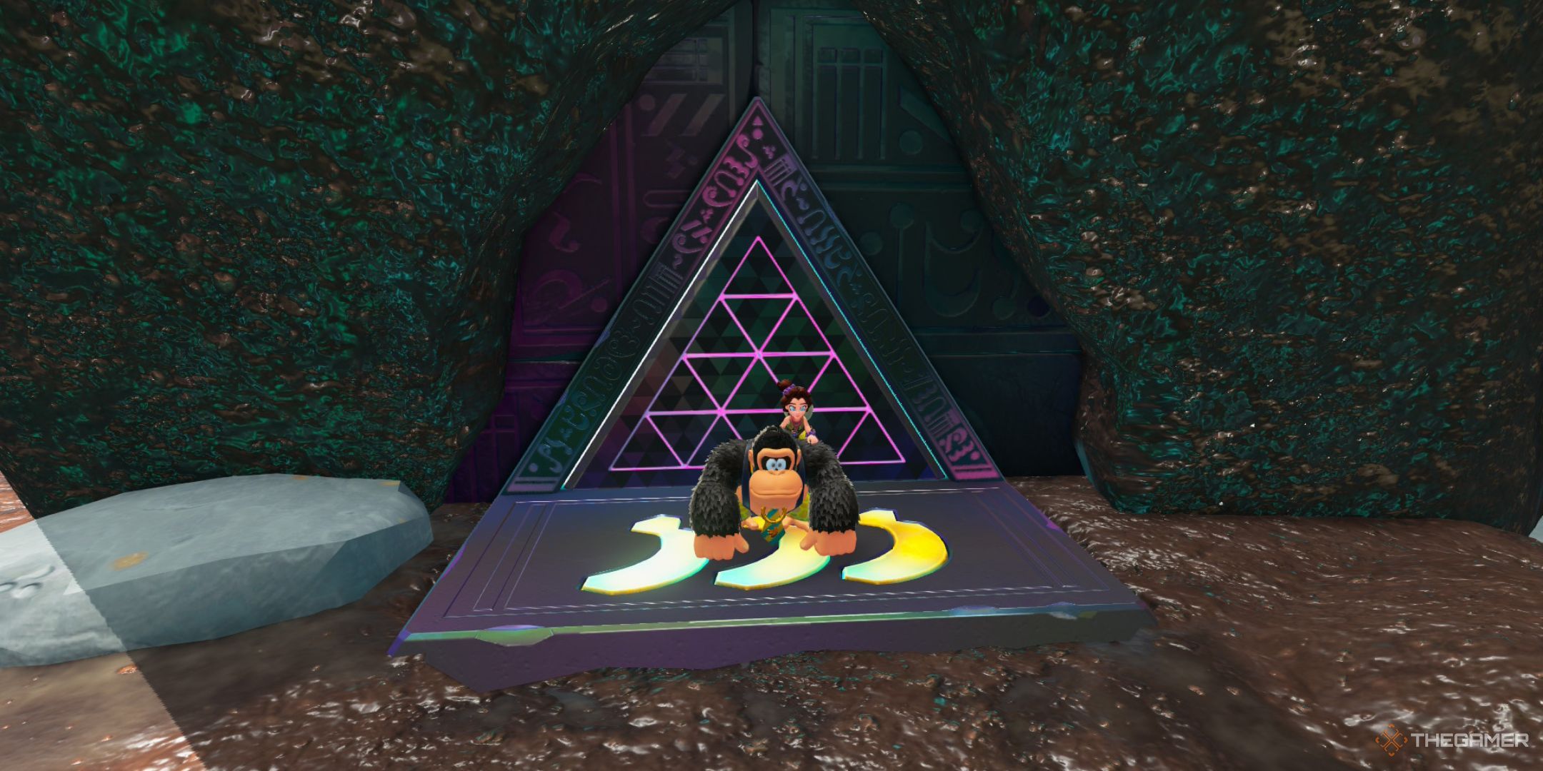 Donkey Kong stands outside the entrance to the Spiked-Tide Slope challenge course in Donkey Kong Bananza.