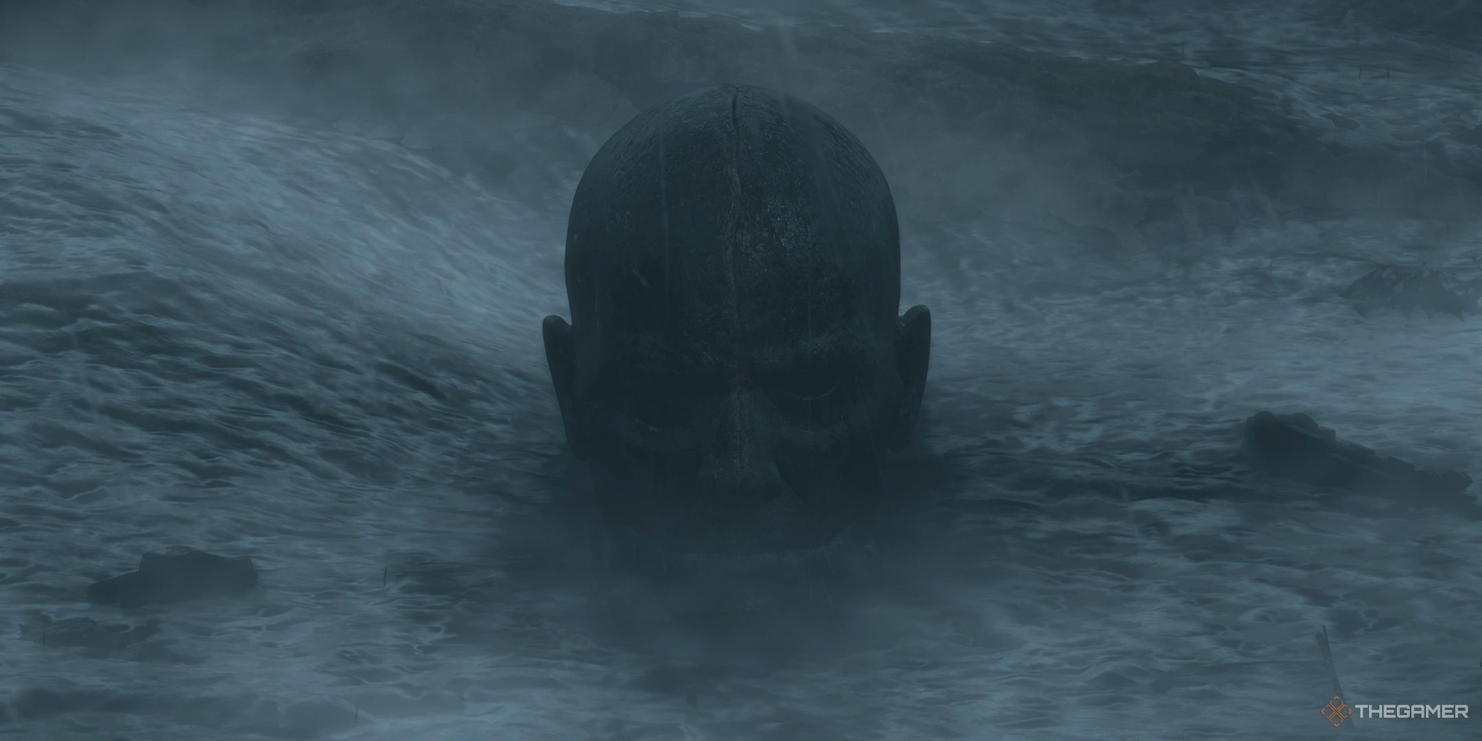 A BT head rising from the tar in death stranding 2 on the beach.