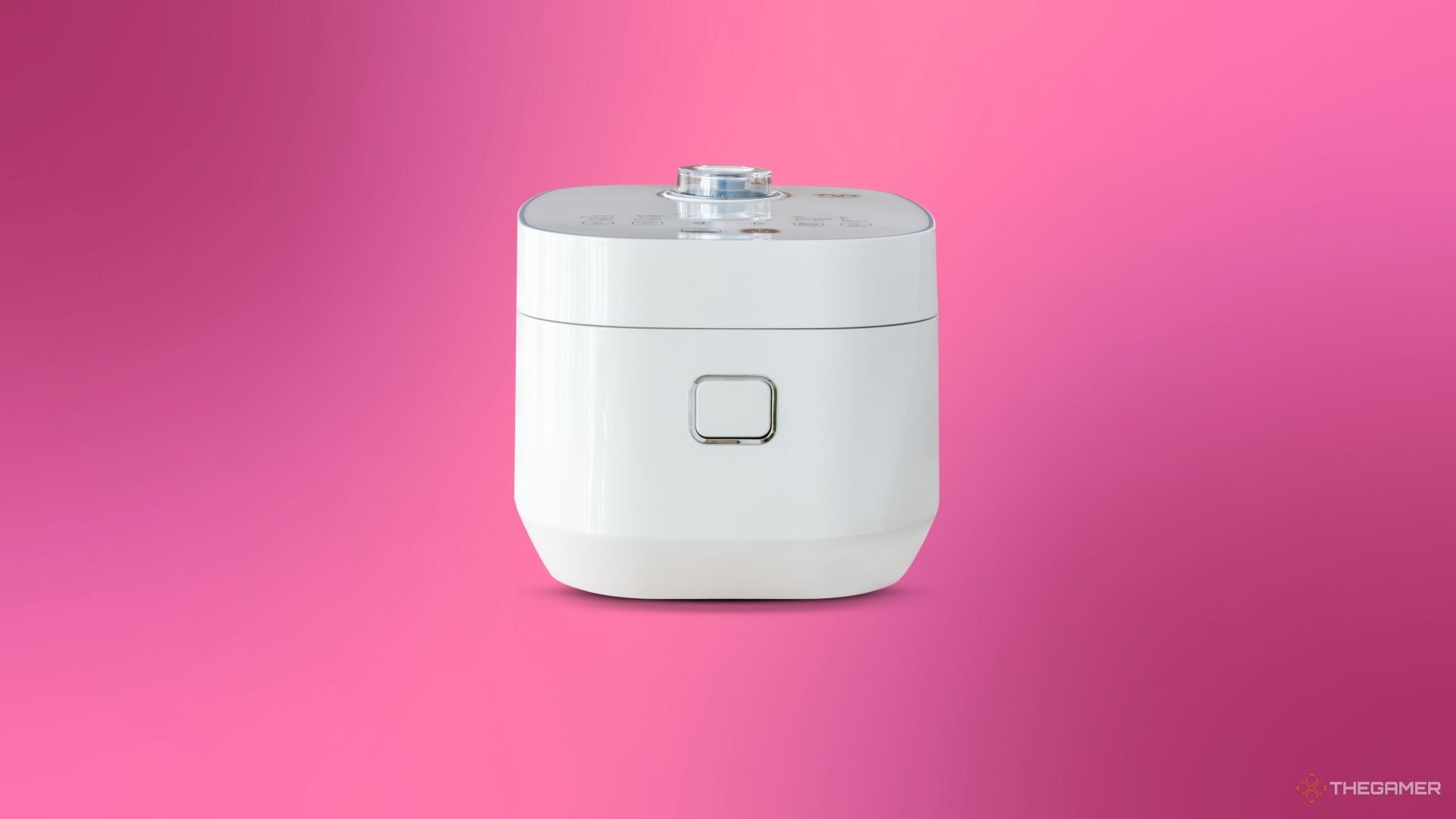A rice cooker against a magenta background.