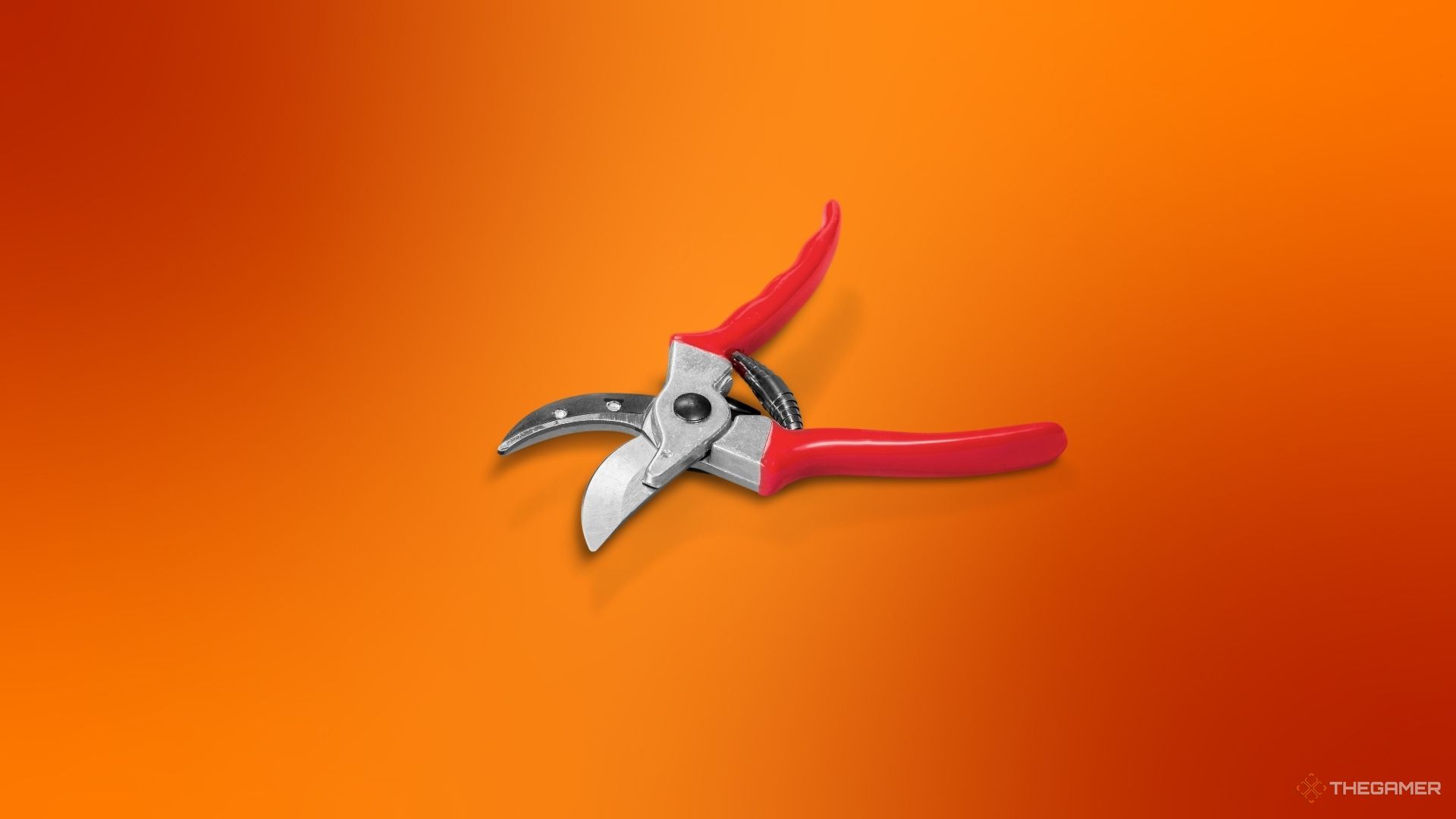 A pair of garden shears against an orange background.