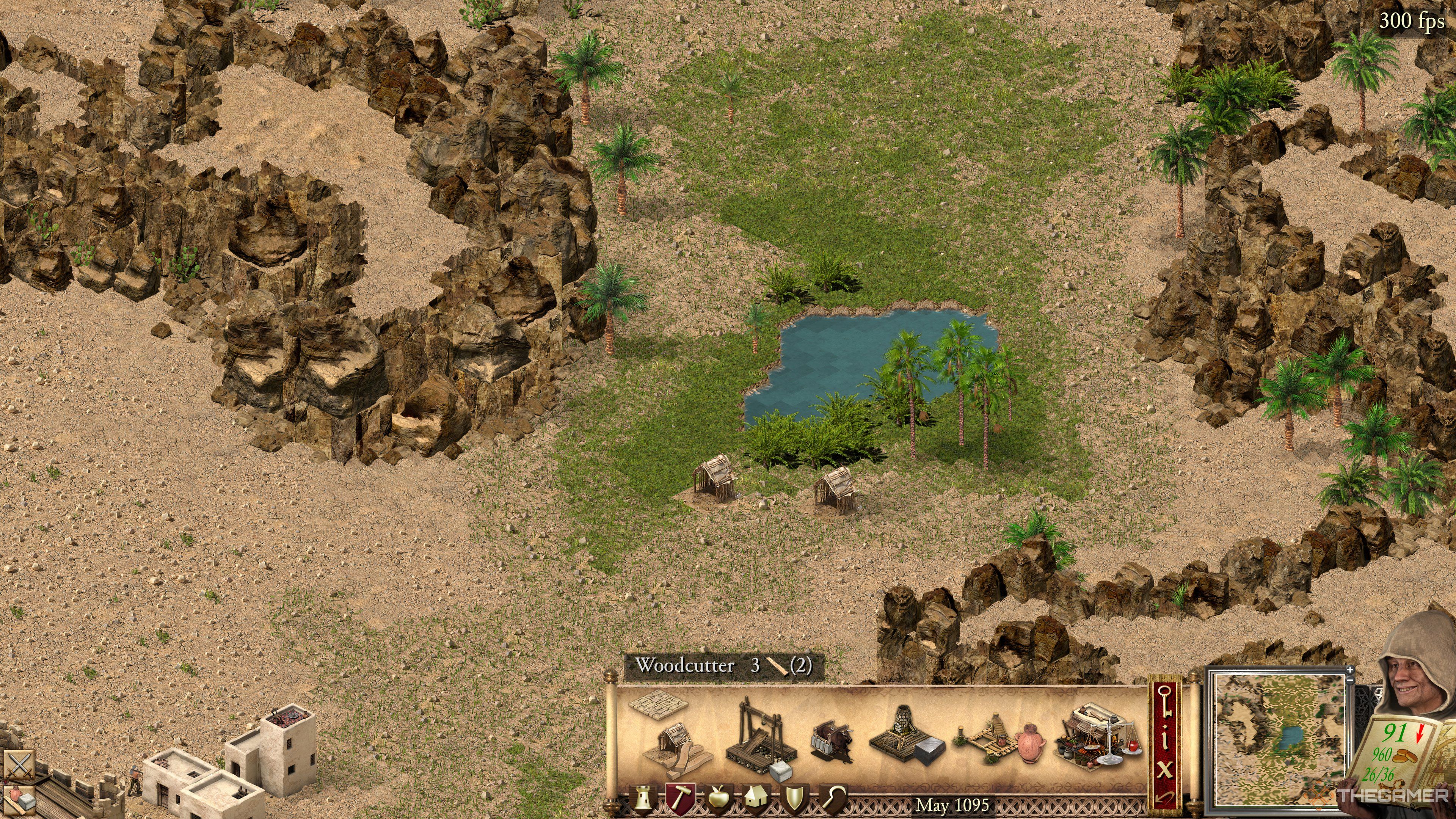 Woodcutters near an oasis in Stronghold Crusaders Definitive Edition. 