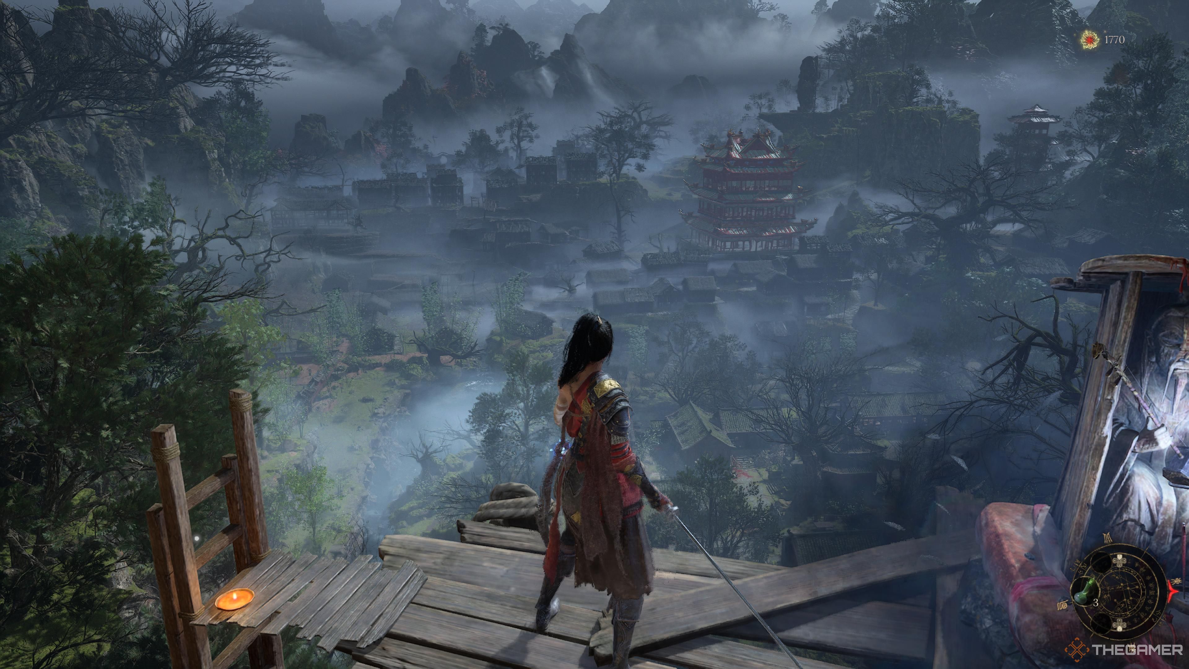Wuchang standing on a cliff looking over buildings below in wuchang fallen feathers.
