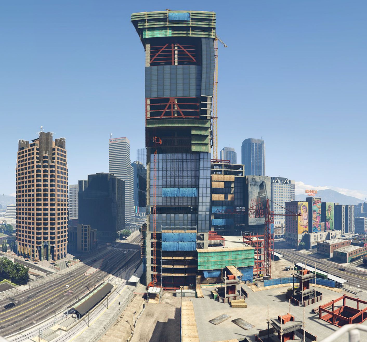 a large skyscraper under construction, with scaffolding all around it in gta 5