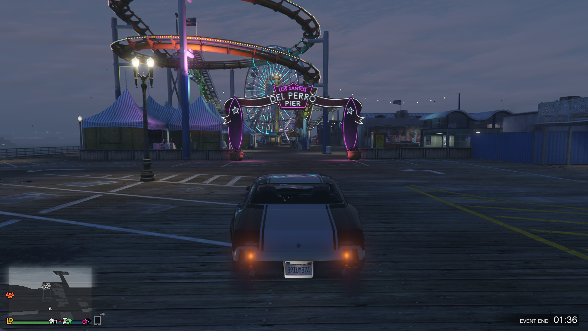 a muscle car parked outside a fairground in gta 5