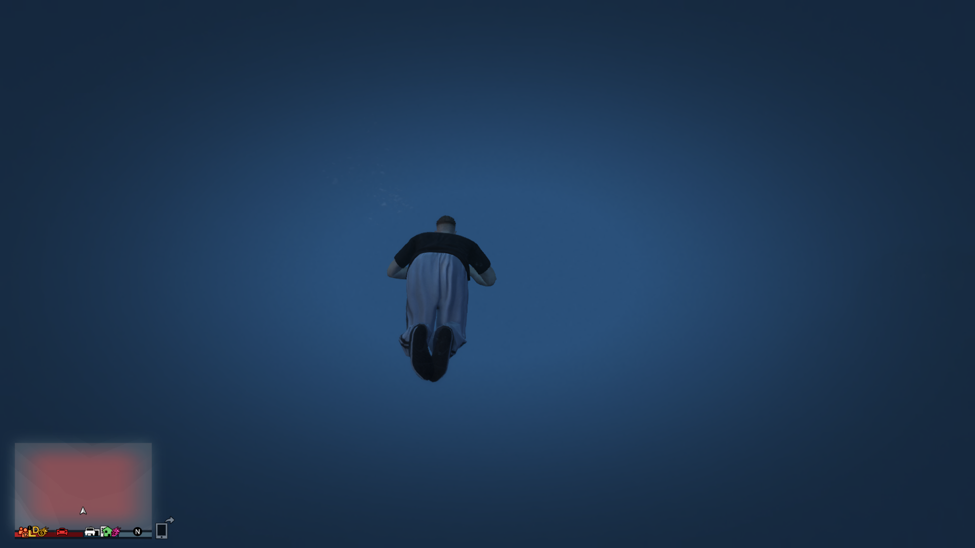 a player in gta online diving in the middle of a vast blue ocean