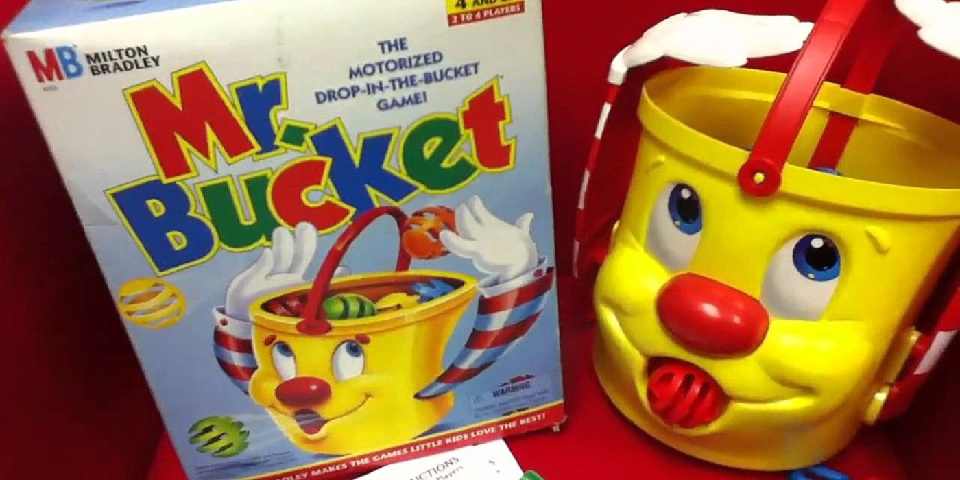 Mr. Bucket board game bucket with piece in mouth and box