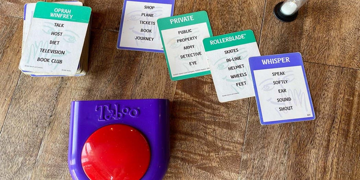 Taboo board game cards and red buzzer