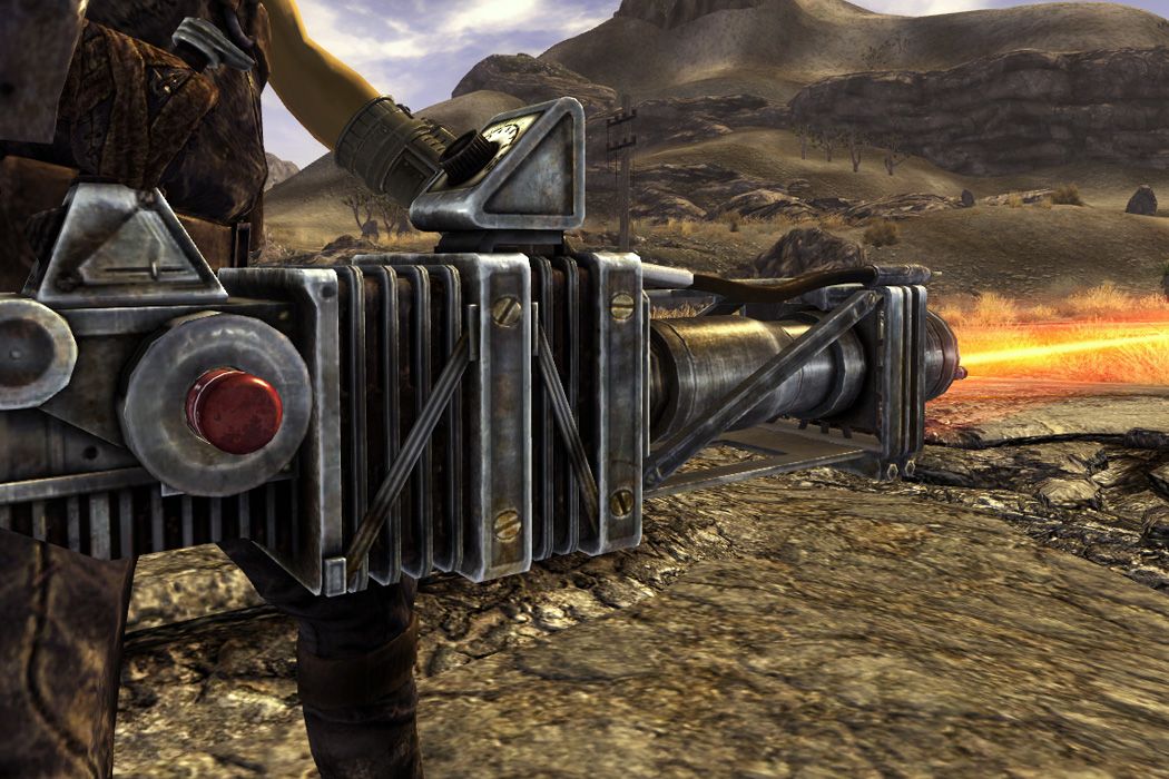 a character holding a gatling laser while it fires