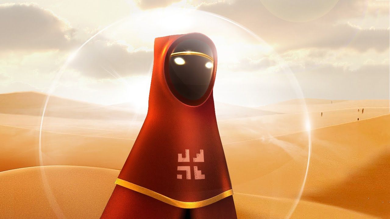 a close up of the robed character in journey
