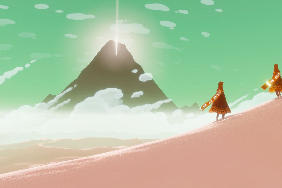 two people in journey looking at the mountain
