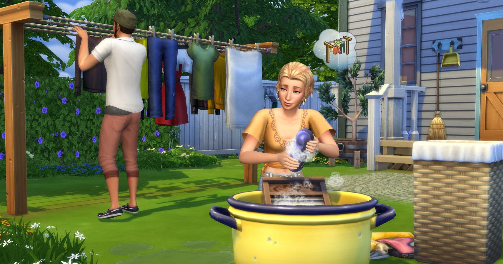 Two sims doing laundry outside with a tub and line.