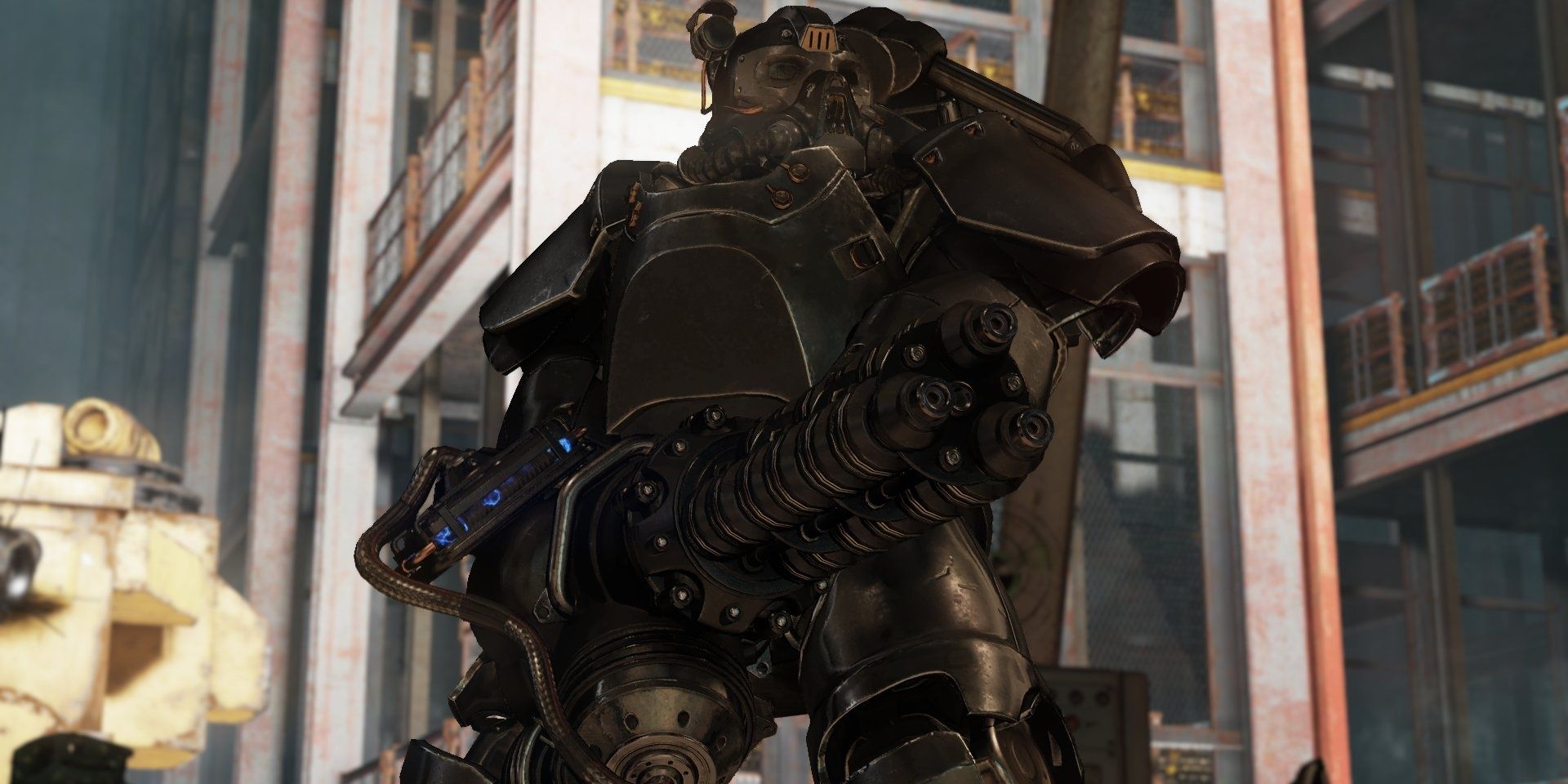 A large character in Power Armor wields the Gauss Minigun in Fallout 76.