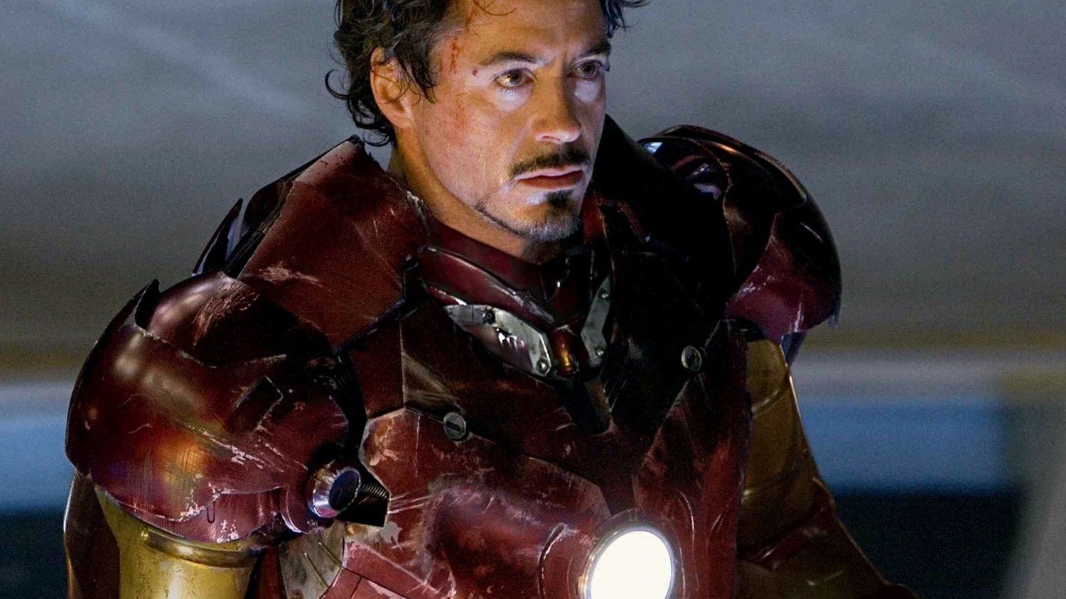 Iron Man looking wounded in Iron Man