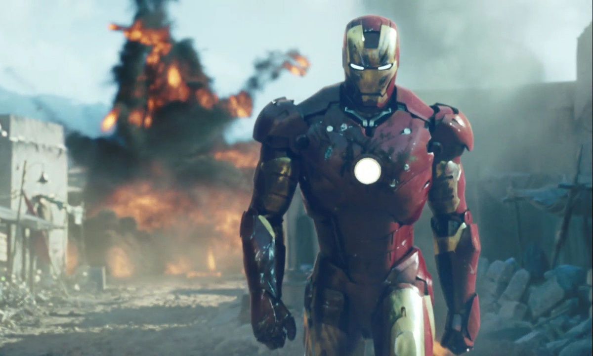 iron man walking away from an explosion