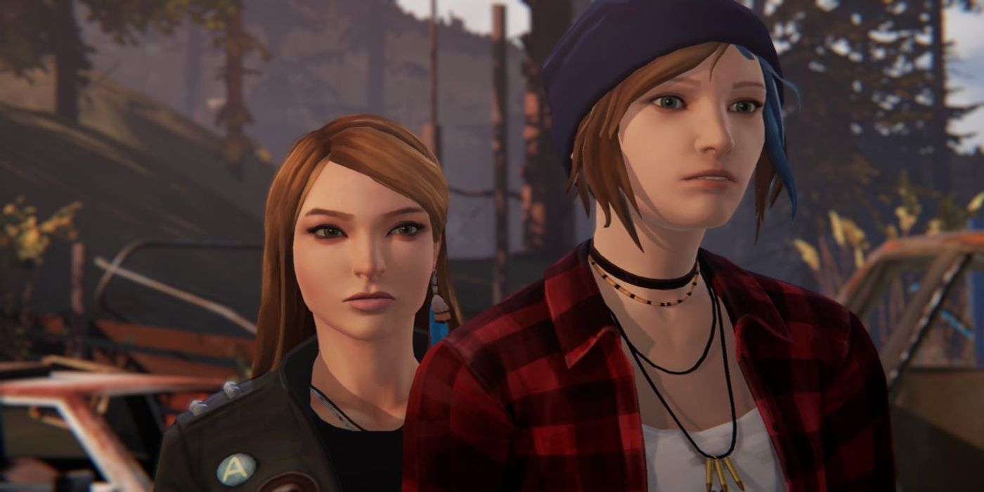 Chloe and Rachel standing closely next to each other in the junk yard and staring off into the distance in deep thought.