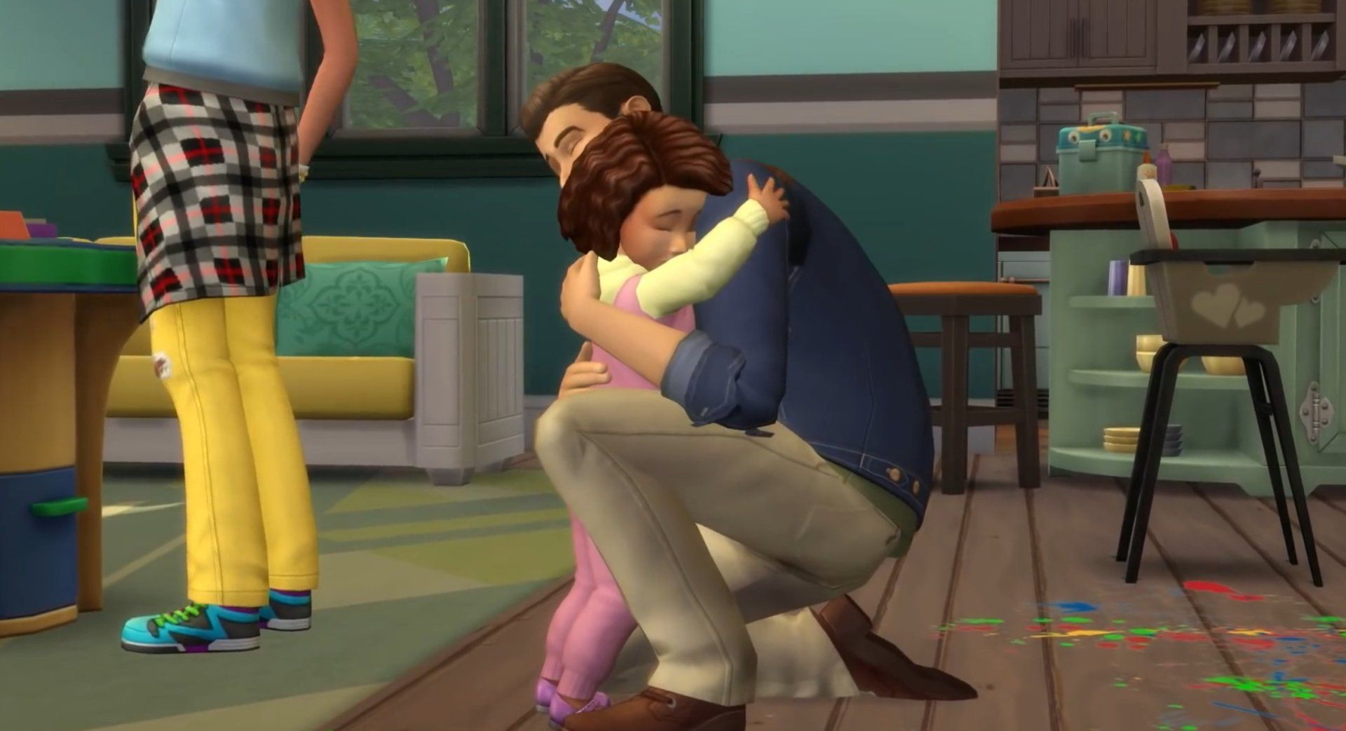 Parenthood screenshot of a father hugging his toddler.