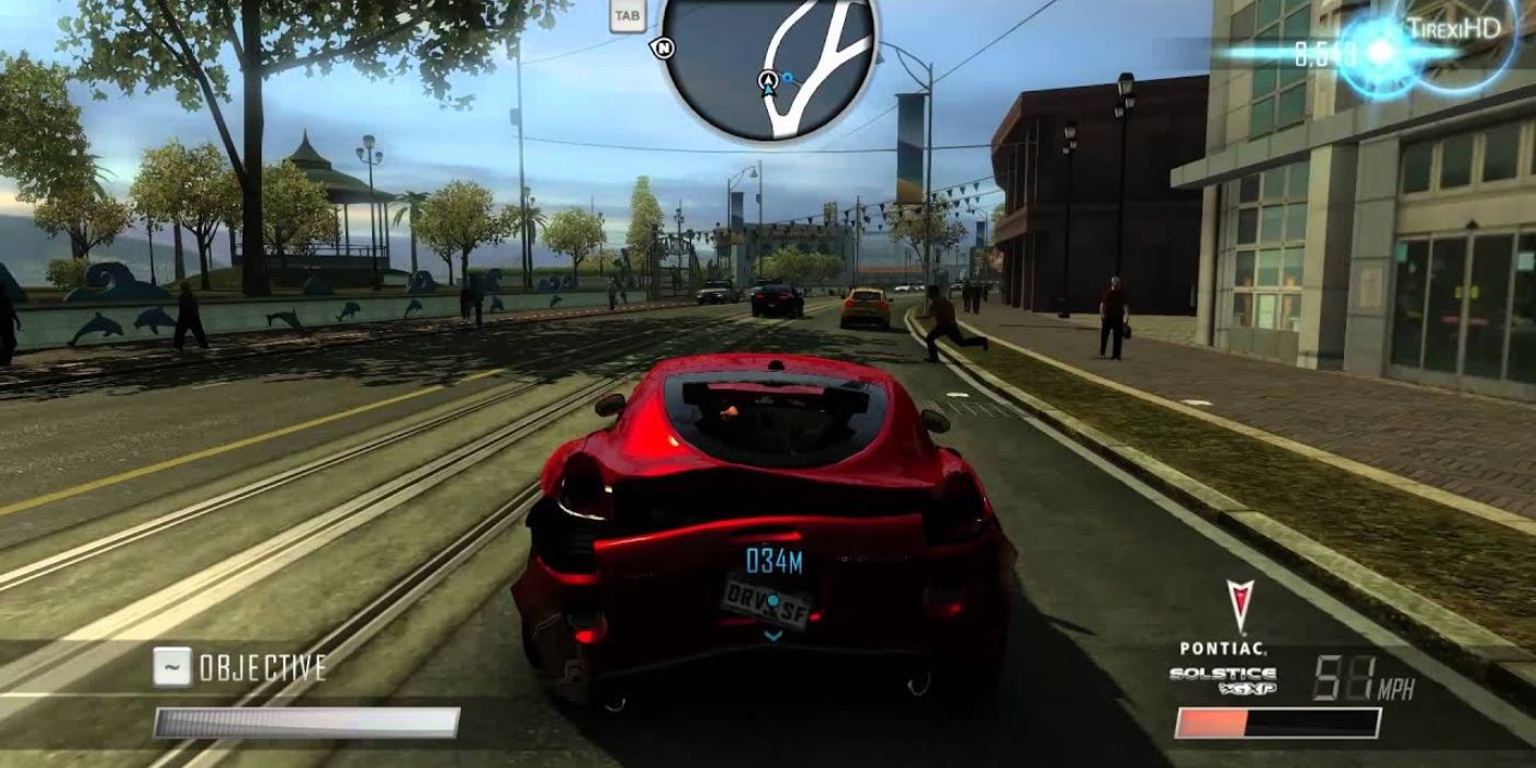 Gameplay of a red car driving through a street