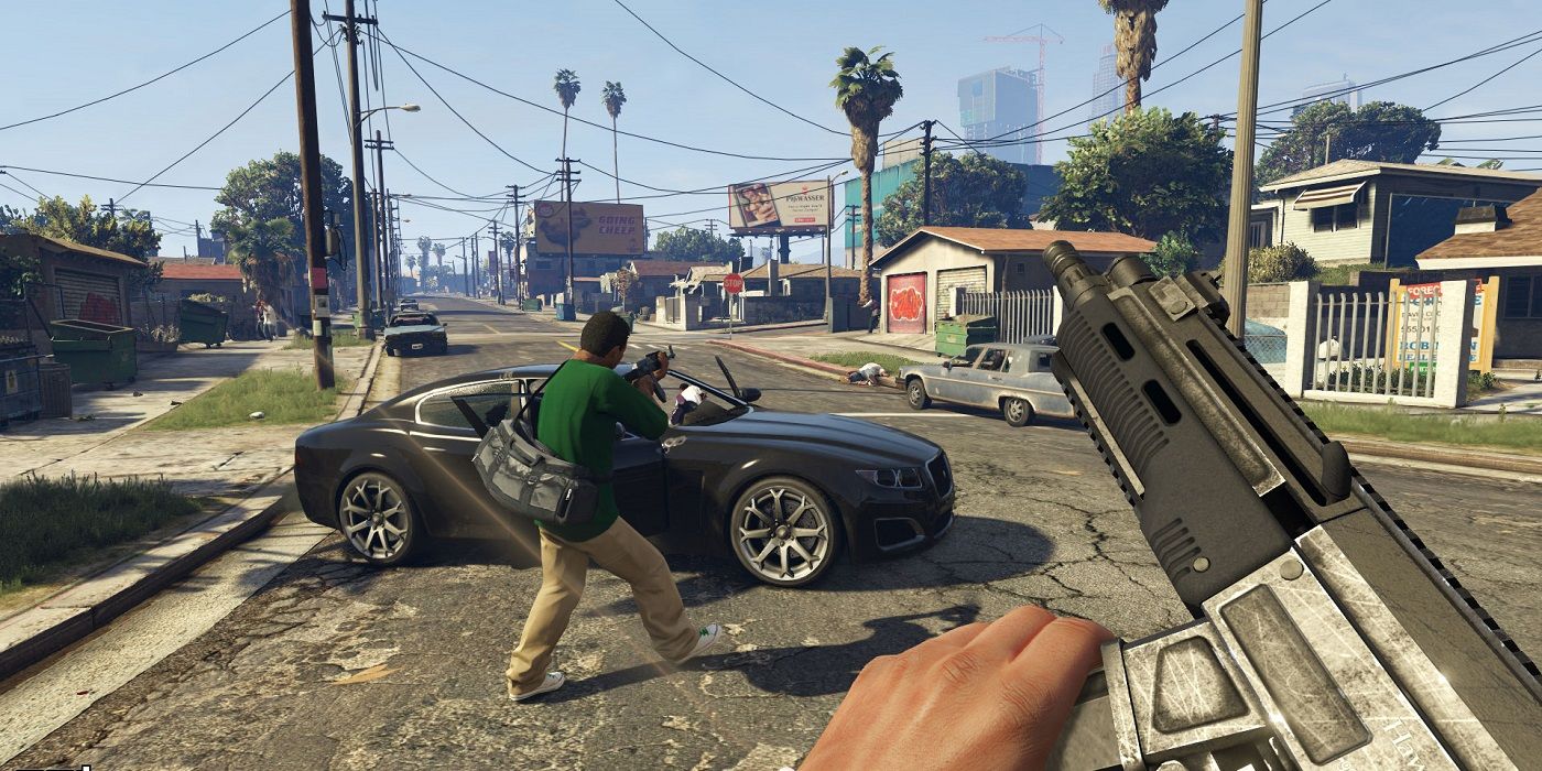 first person perspective of a street side gun fight in Grand Theft Auto V 