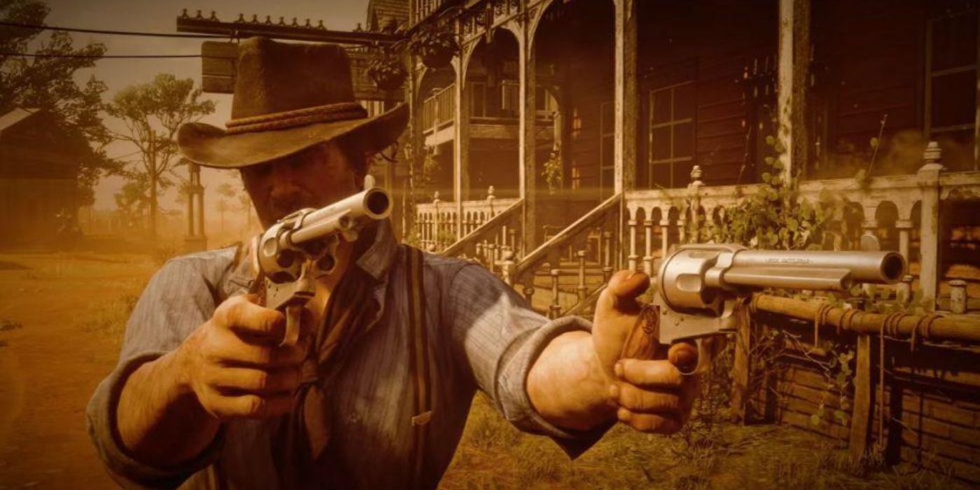 Arthur holding two revolver pistols while the screen fills with the dim beige colors of the dead eye system.