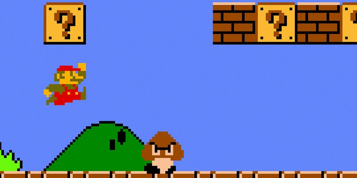 Mario stomps a Goomba in the original Super Mario Bros.