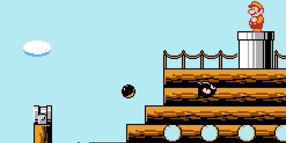 Super Mario Bros. 3 airship stage gameplay with Mario overlooking Bullet Bill launchers