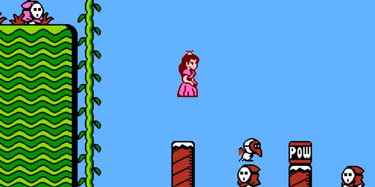 Peach leaps atop a Shy Guy in Mario 2.