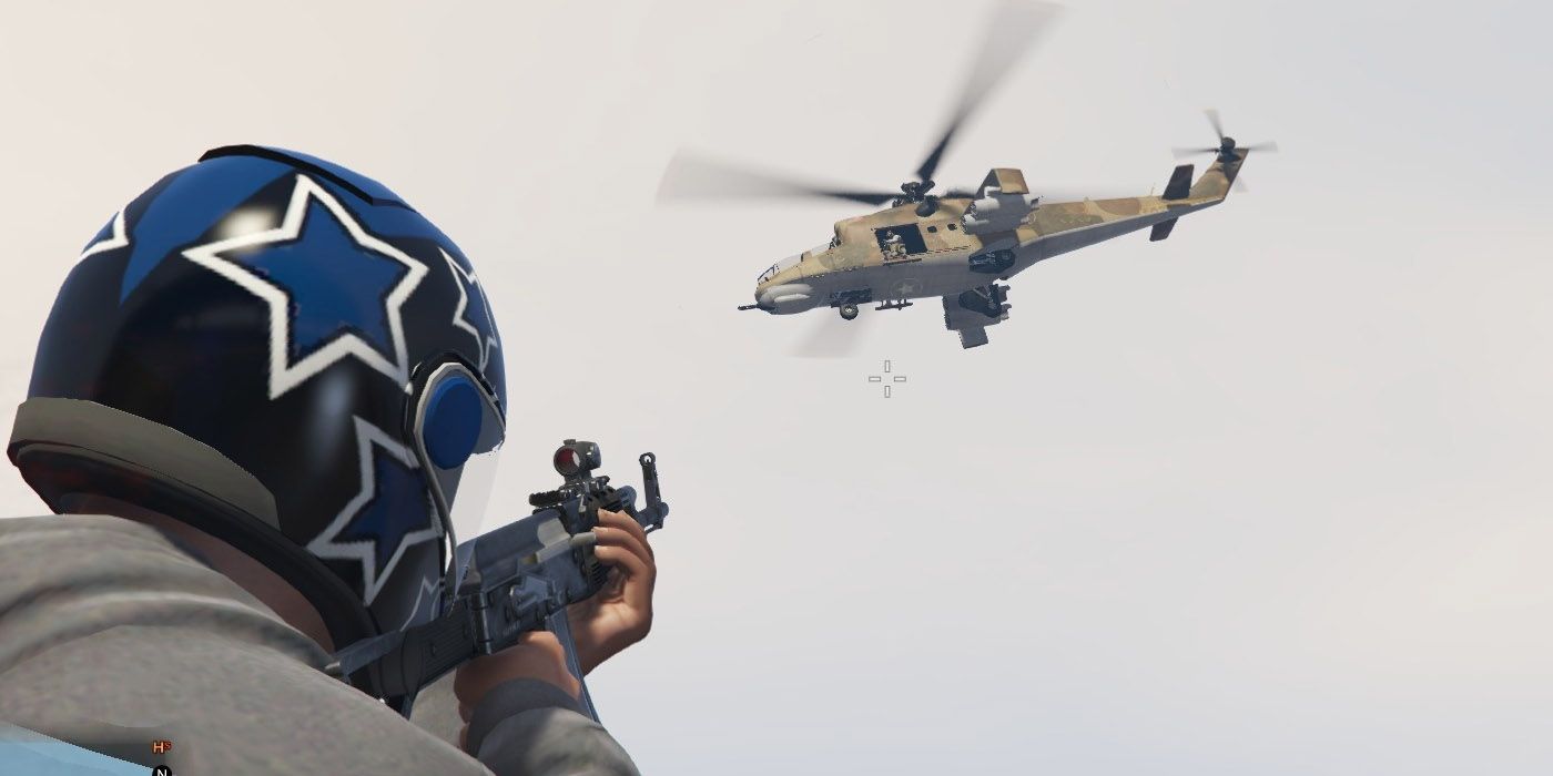 player aiming a gun at a helicopter in gta v with the tanks spawn at five stars mod