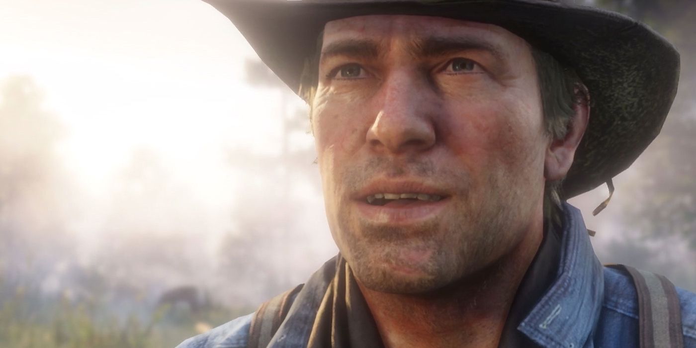 A close-up of Arthur Morgan's face with bright light shining behind him.