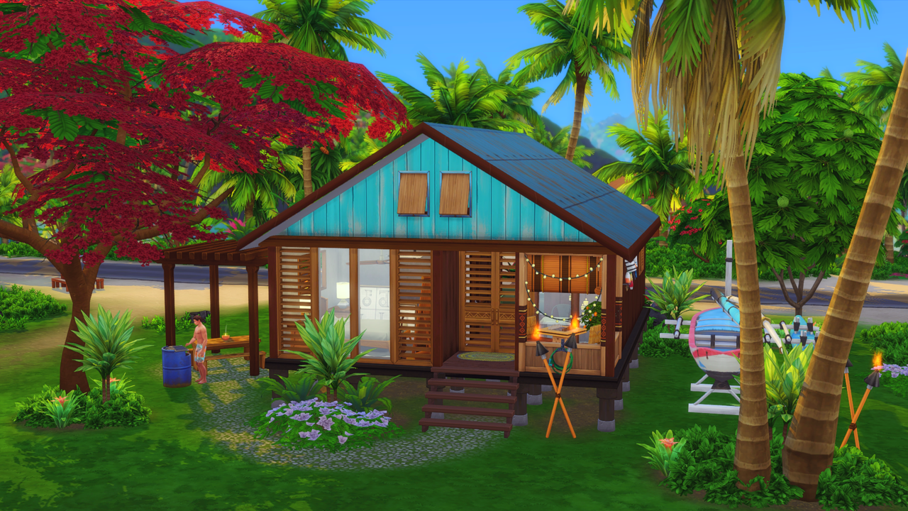 small tropical house on grass with trees besides