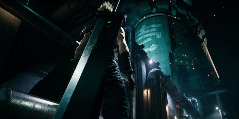 Cloud Strife looks up at a Mako reactor in Midgar.