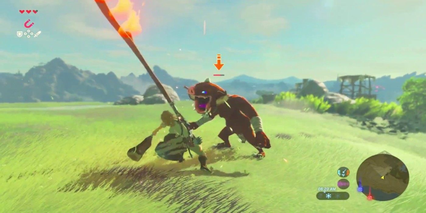 Breath of the Wild Moblin Combat leaning with large flaming stick in grassy field