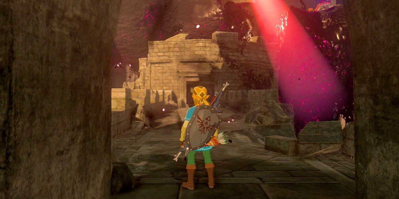 Link at Hyrule Castle with a Guardian's light nearby.