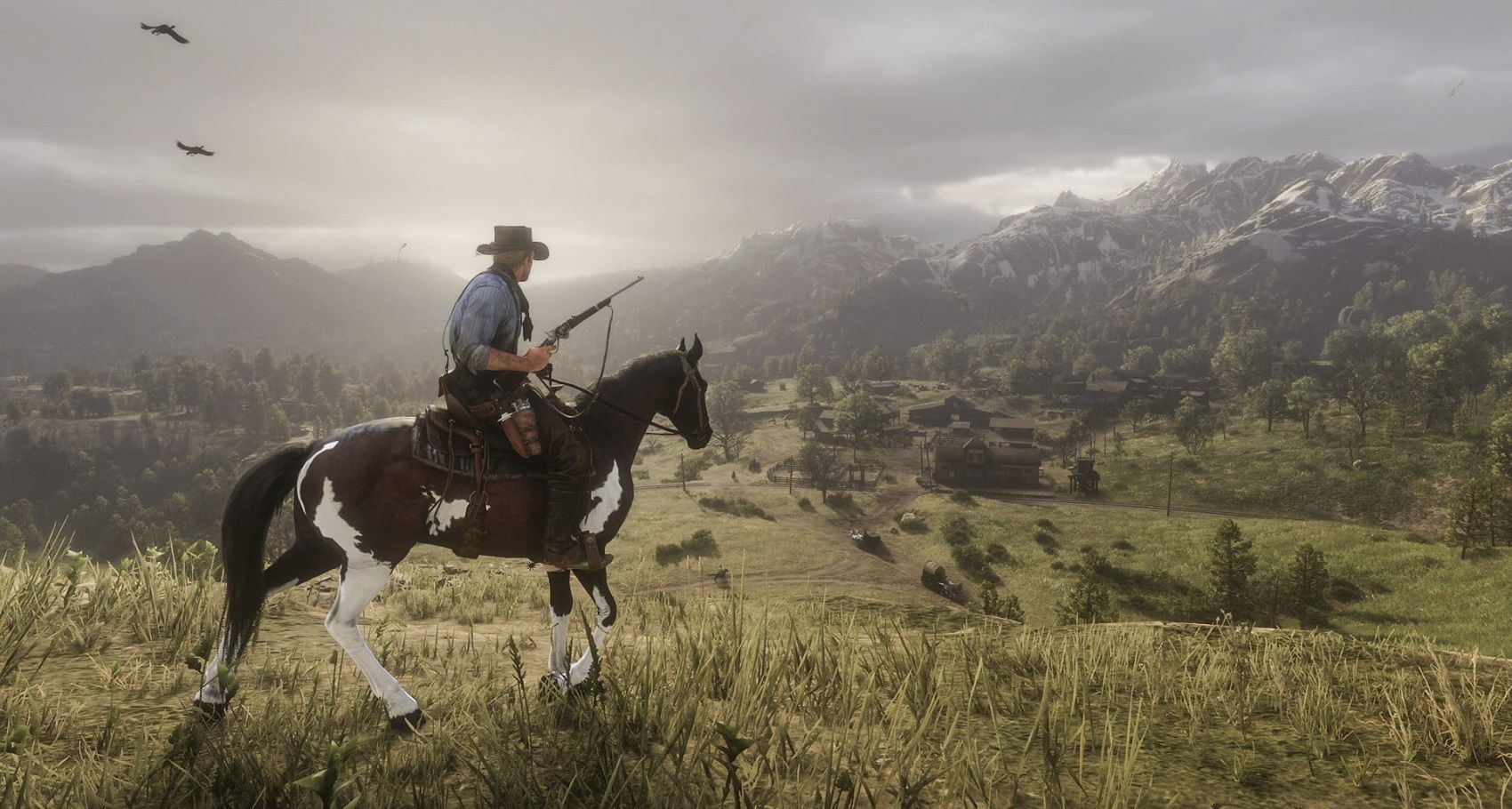 RDR2 Arthur on a horse overlooking the landscape